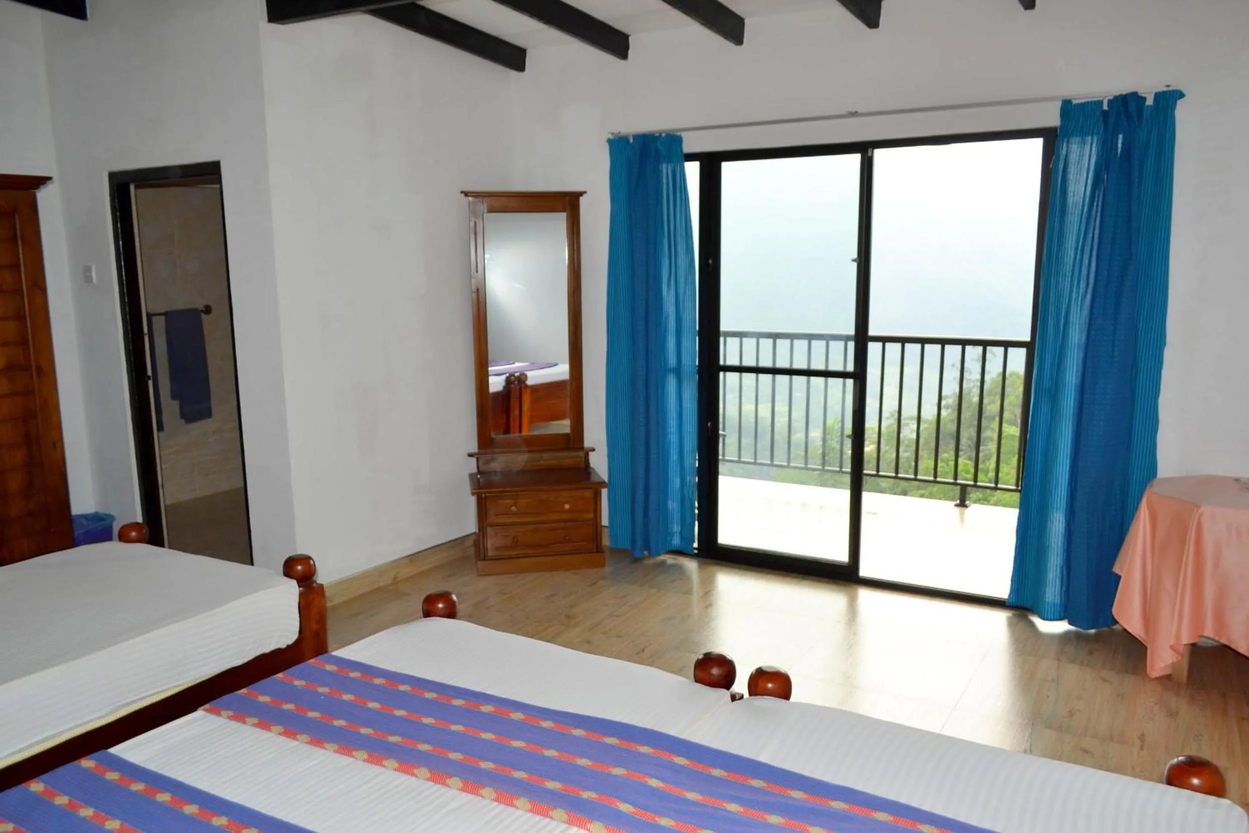 Bed in Hotel Breeta's Garden