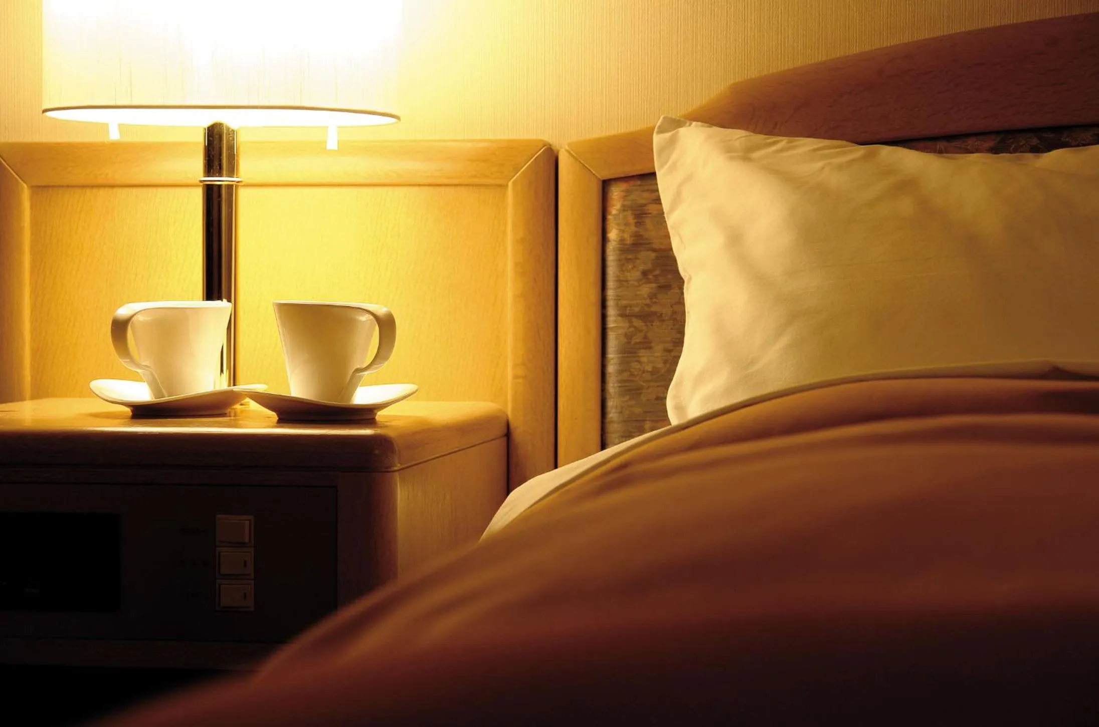 Bed in Hirosaki Plaza Hotel