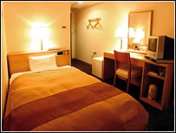 Bed in Hirosaki Plaza Hotel