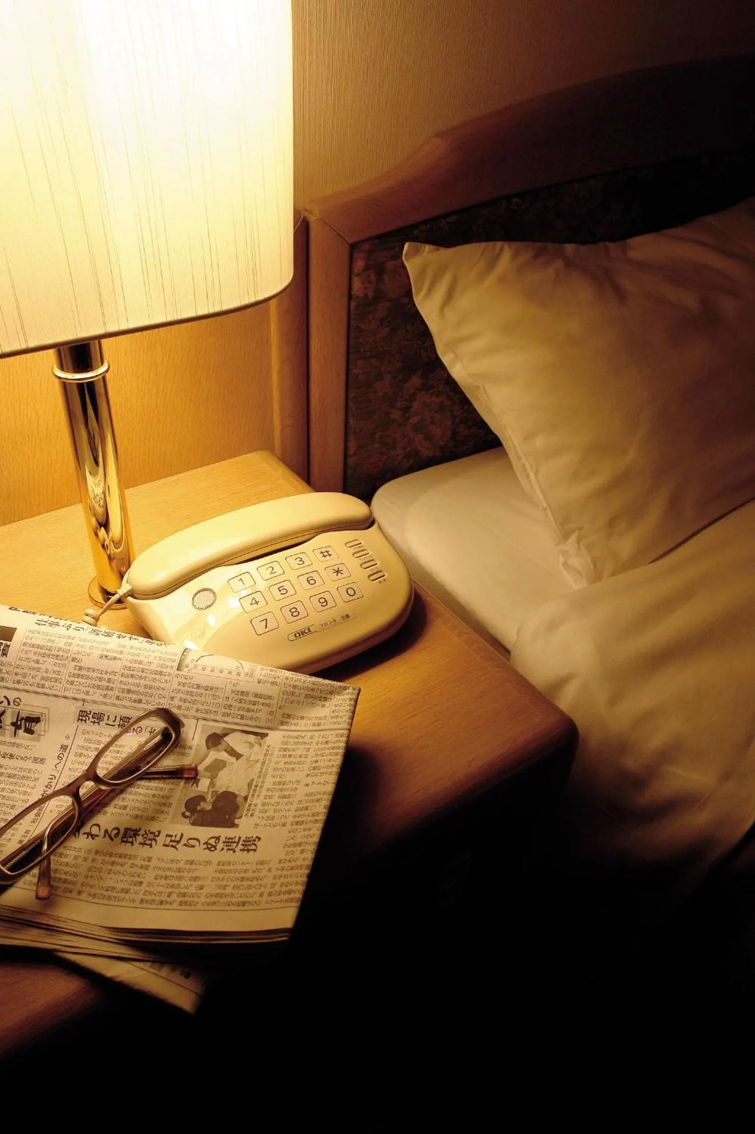 Bed in Hirosaki Plaza Hotel