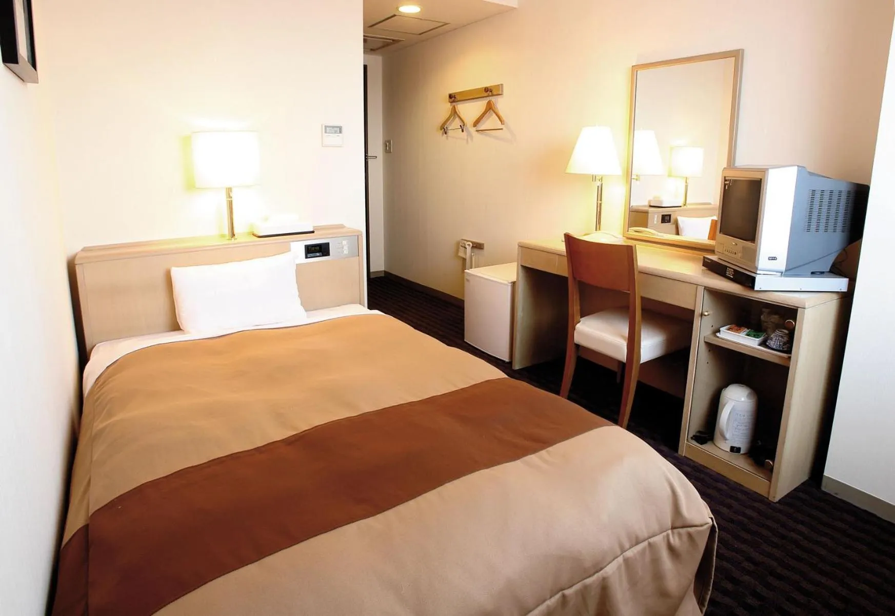 Bed in Hirosaki Plaza Hotel