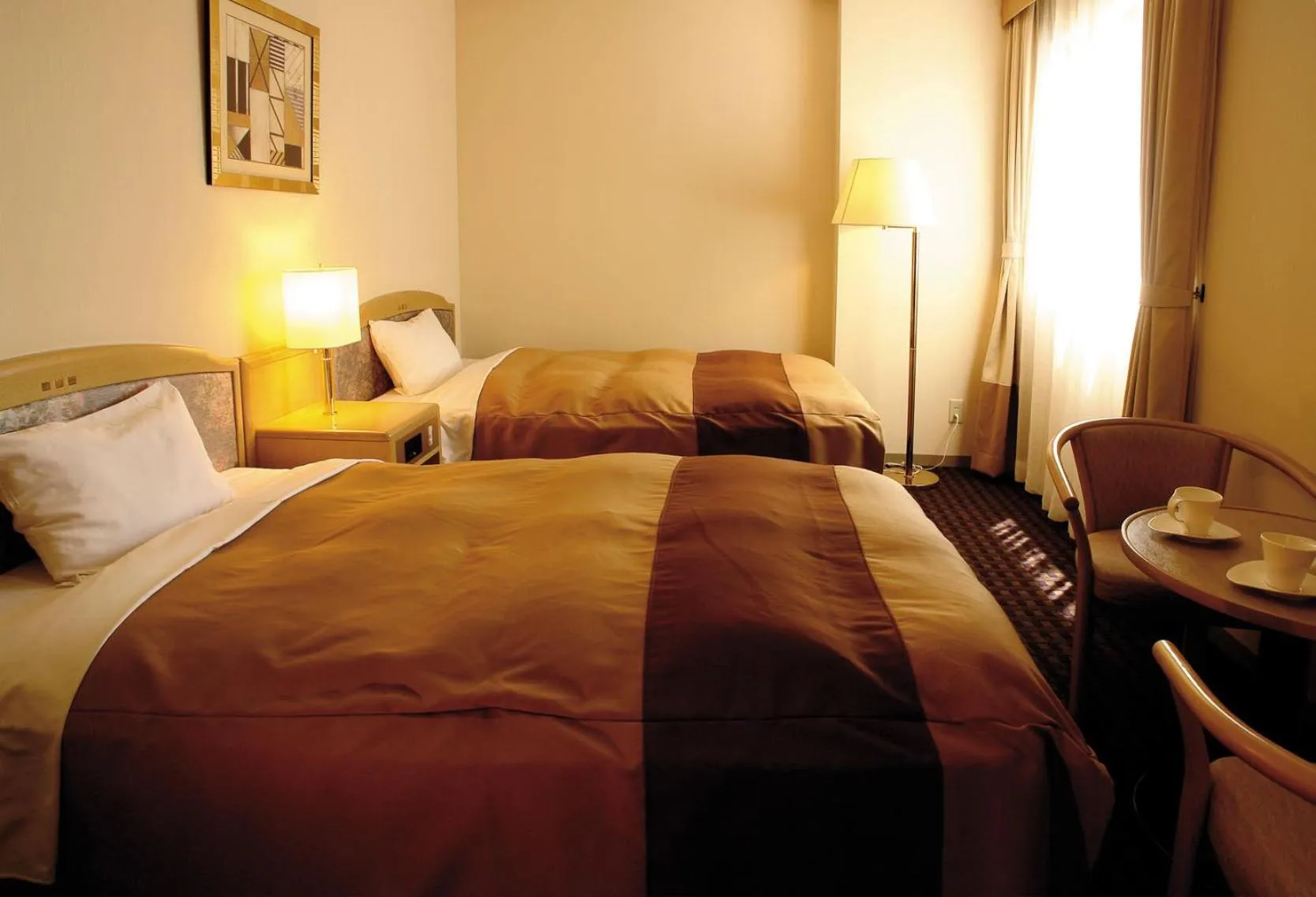 Bed in Hirosaki Plaza Hotel