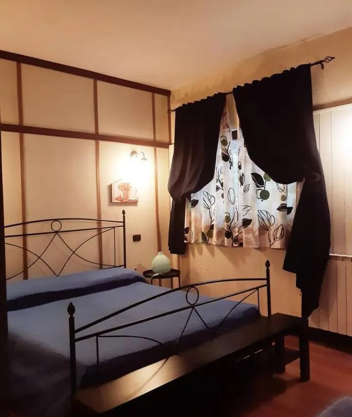 Bed in LA GROTTA Bed and Breakfast