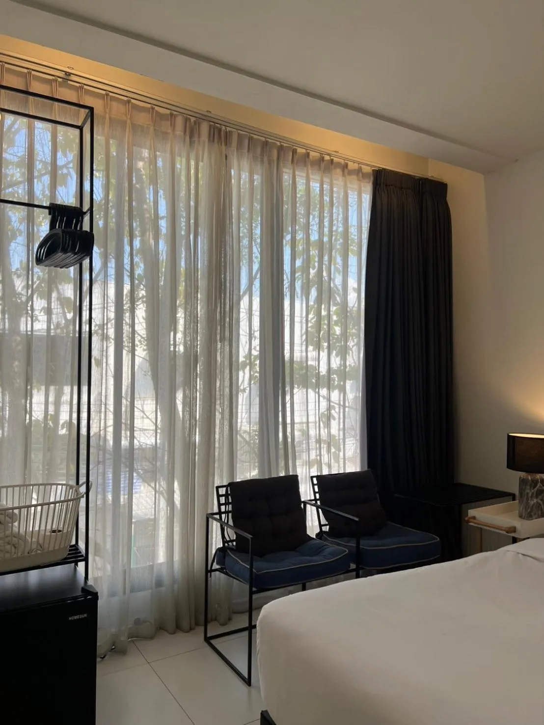 Seating area, Bed in POR Santitham