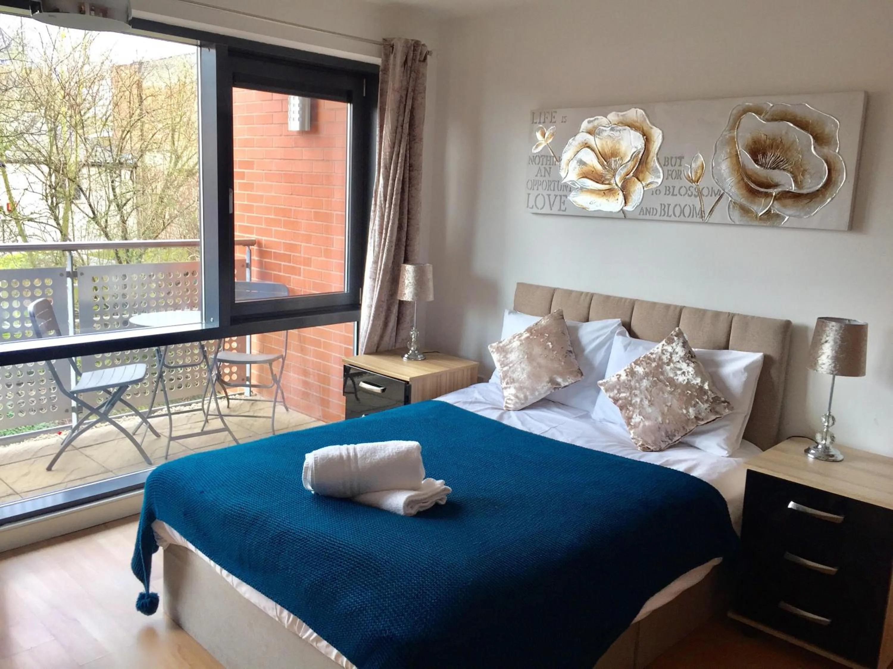 Bed in Empire Serviced Apartments