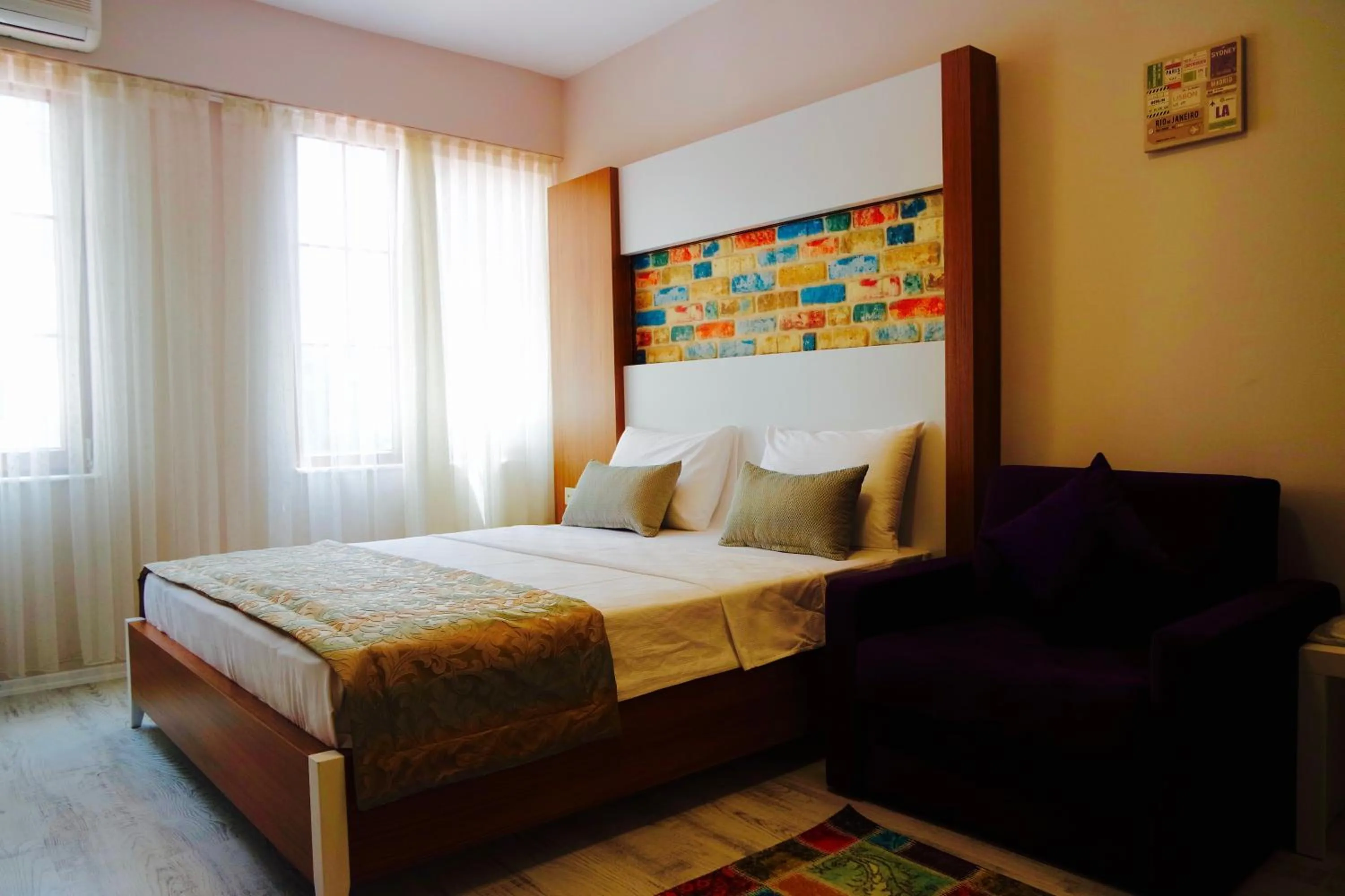Bed in Ale Boutique Apartments