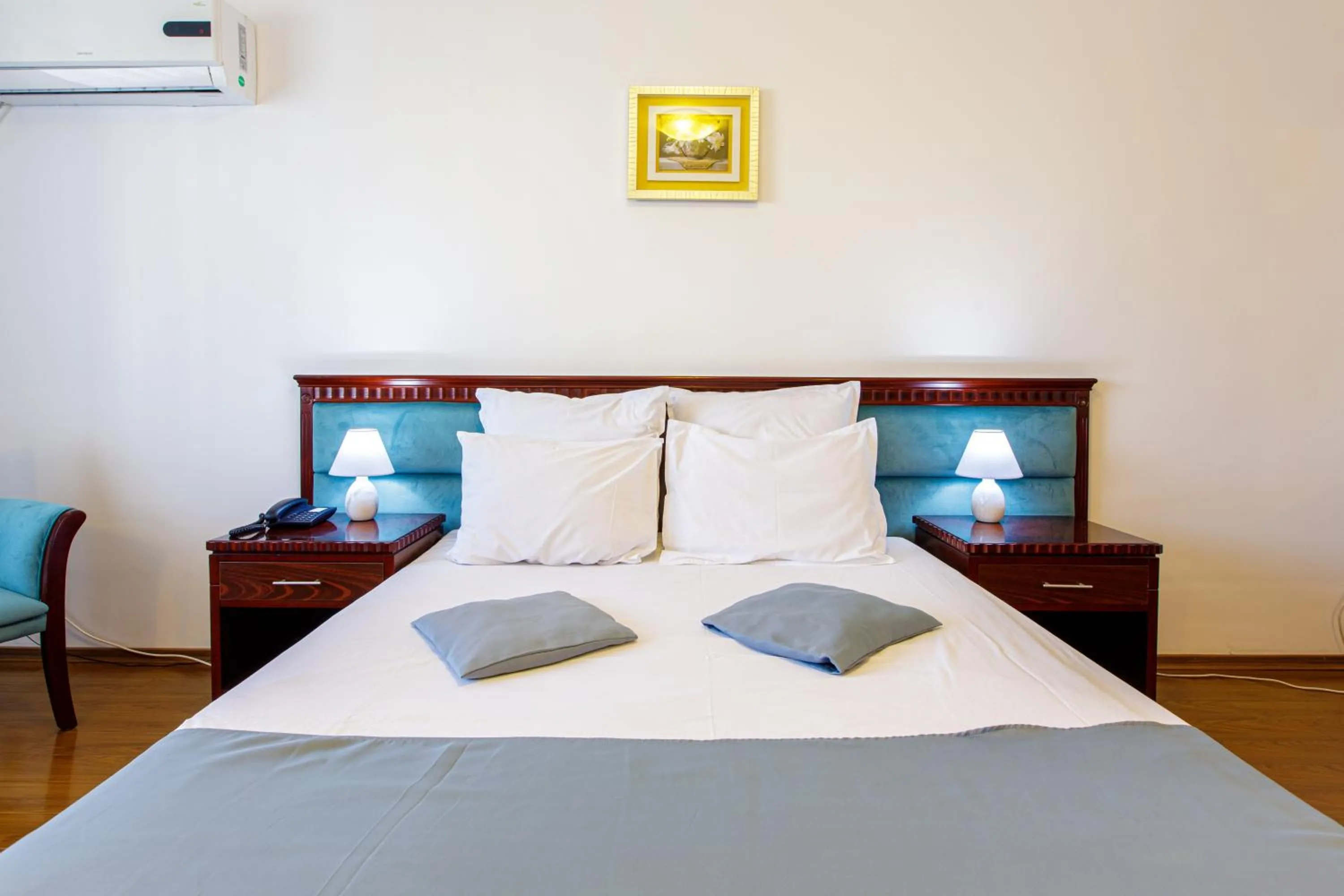 Bed in Lira Pacific Aparthotel