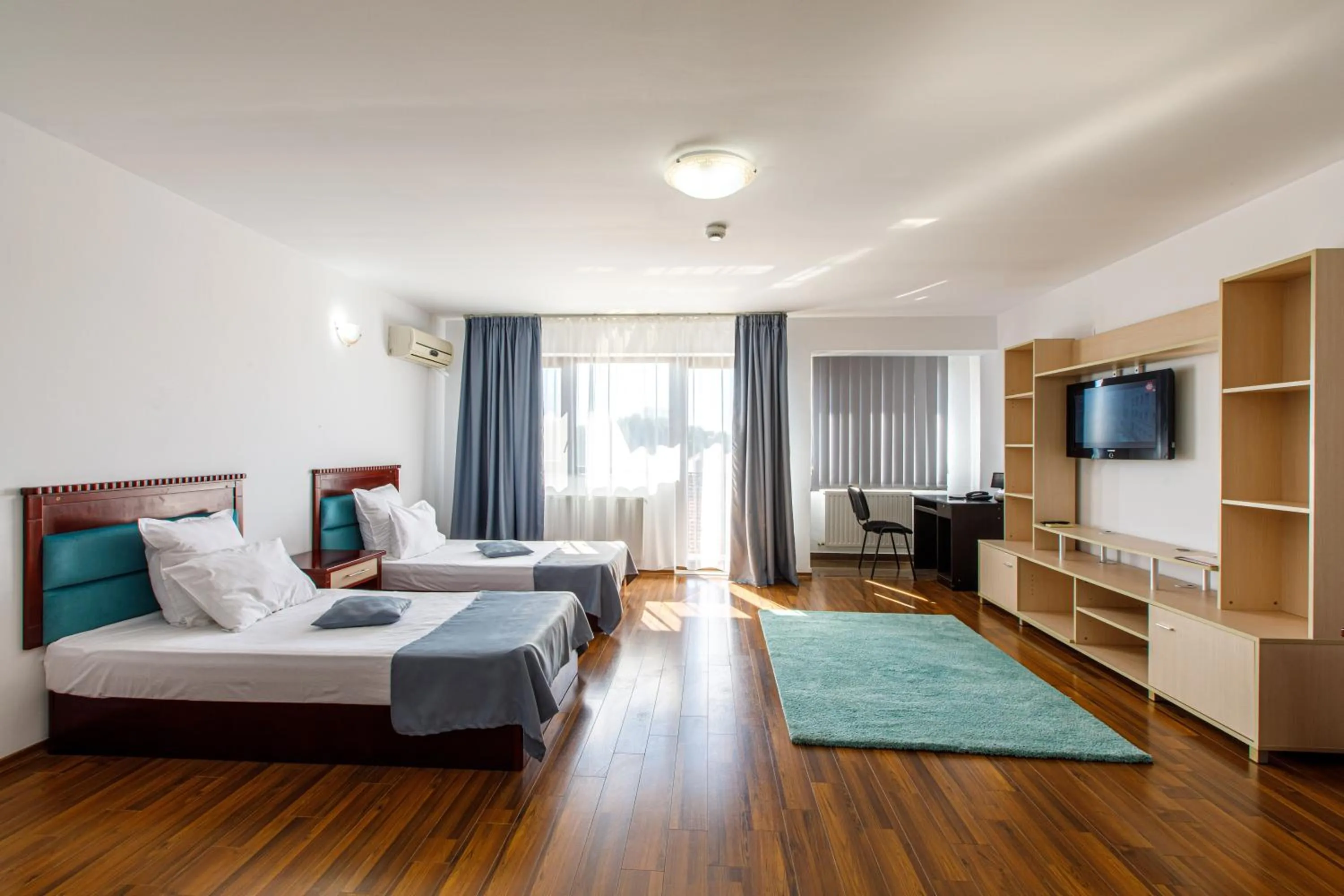 Living room, Bed in Lira Pacific Aparthotel