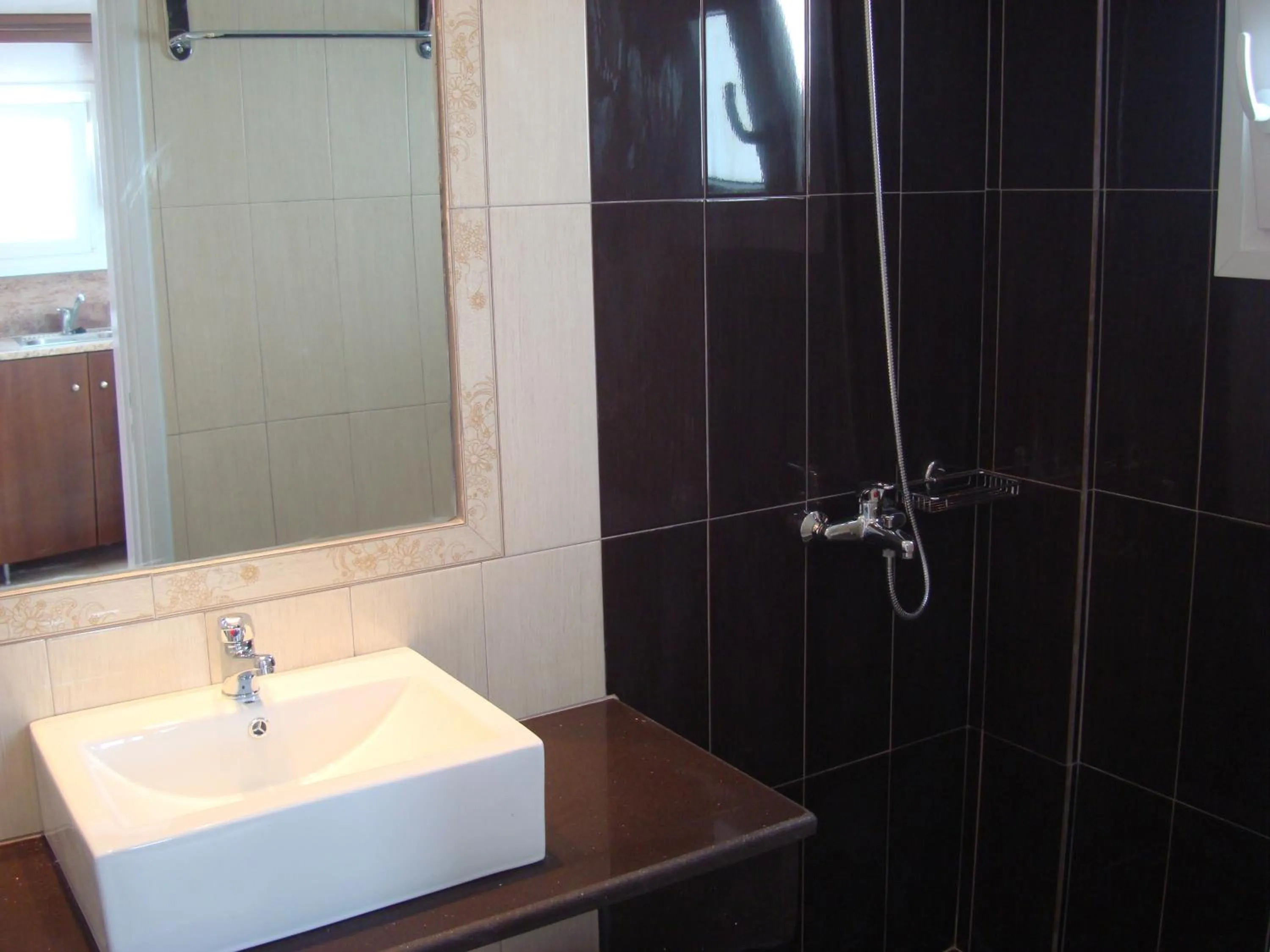 Shower in Elena Studios & Suites