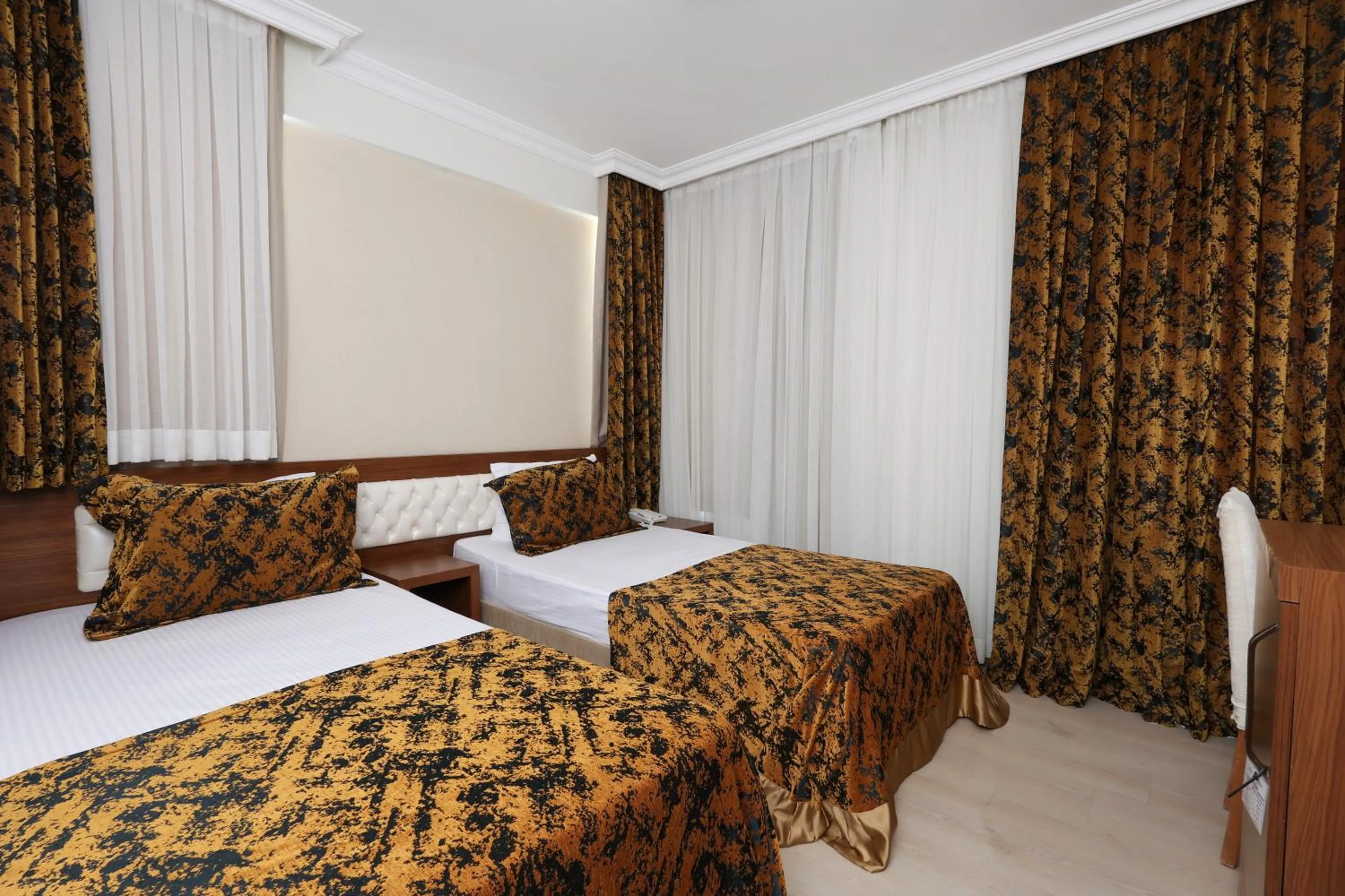 Bed in The Corner Park Hotel