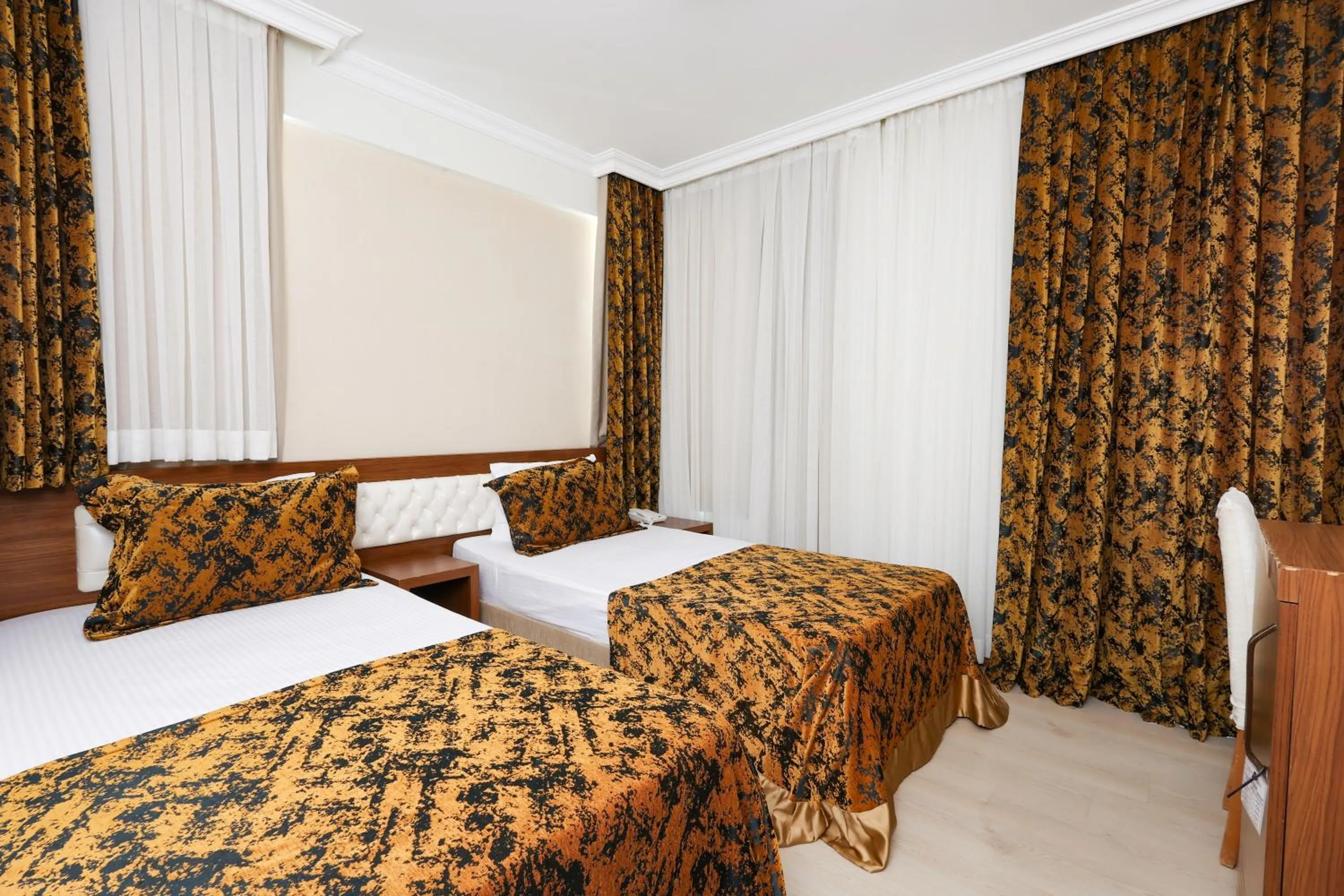 Bed in The Corner Park Hotel