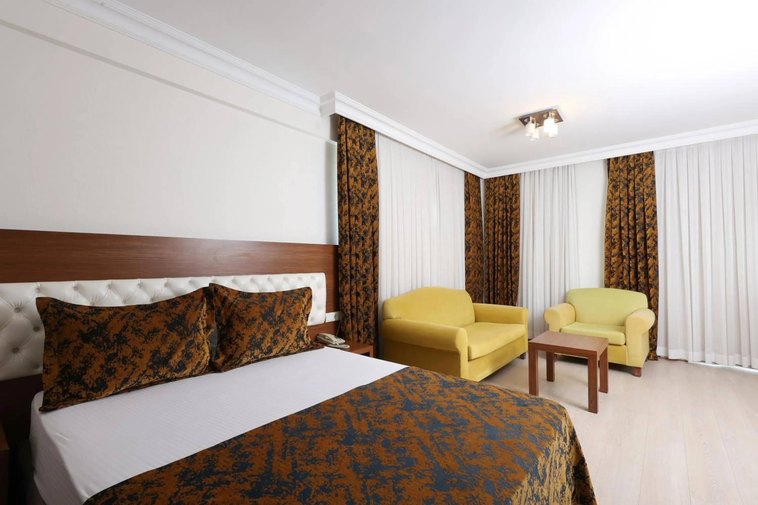 Bed in The Corner Park Hotel