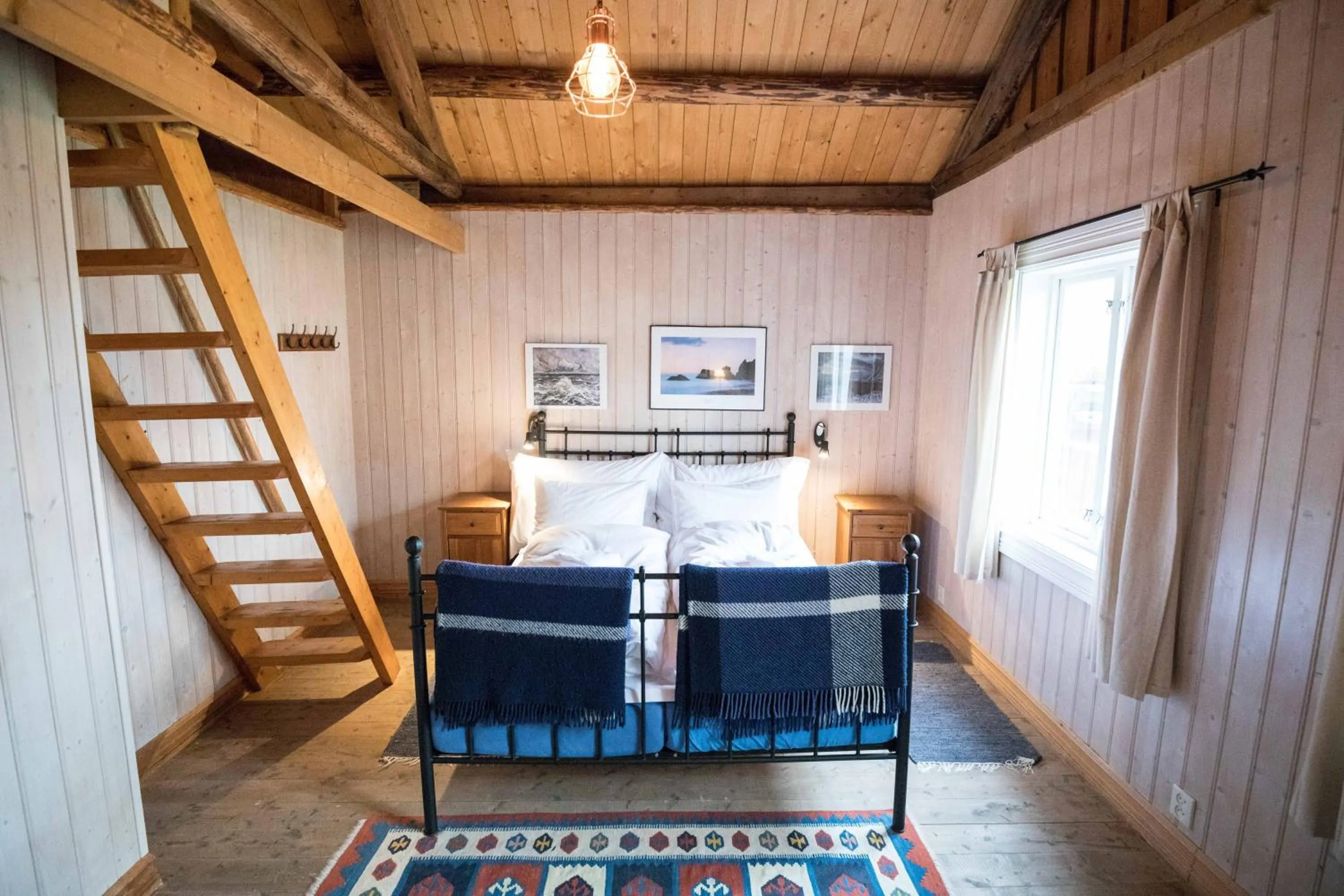 Bedroom in Reine Rorbuer - by Classic Norway Hotels