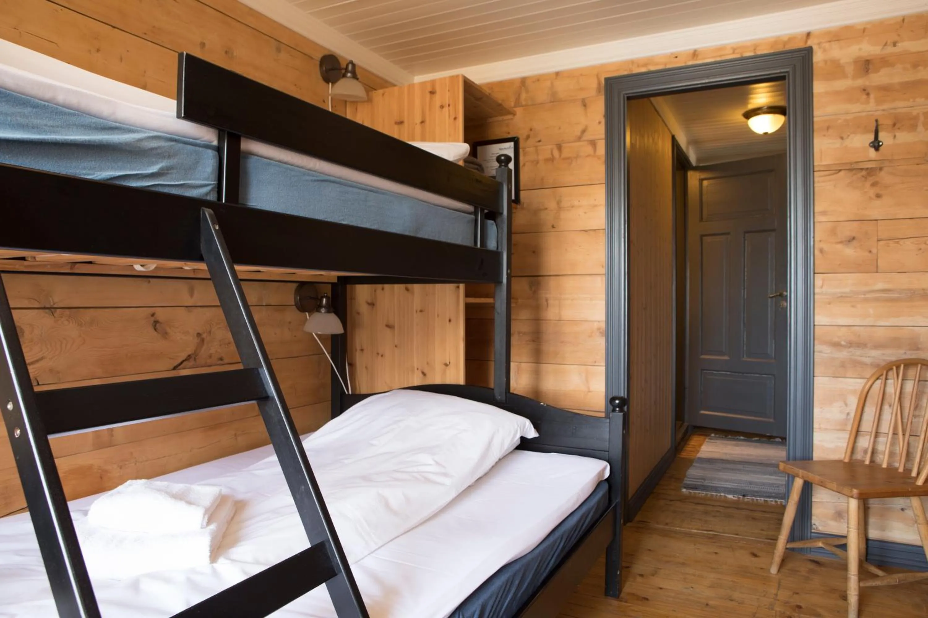 Bedroom, Bed in Reine Rorbuer - by Classic Norway Hotels