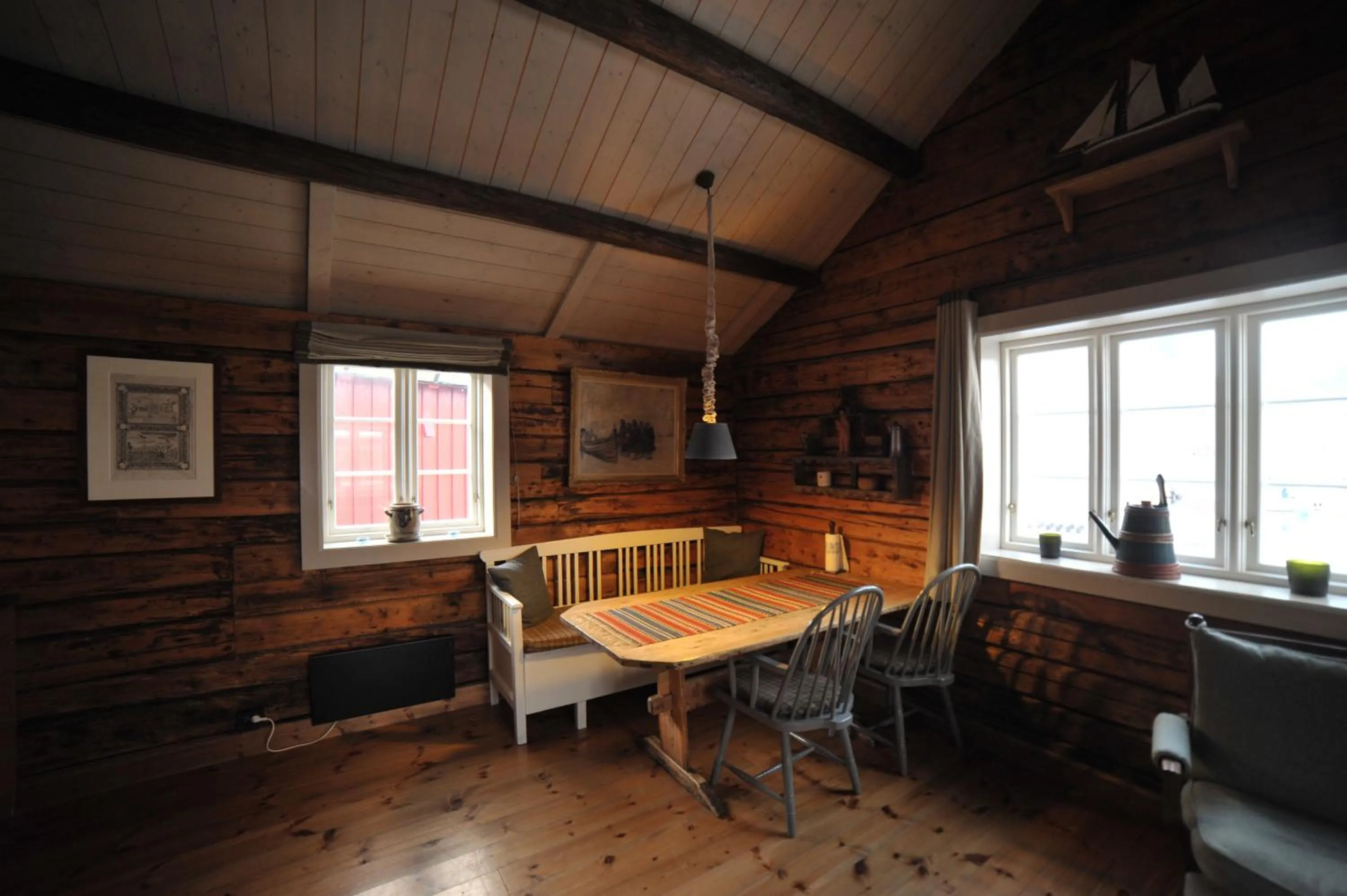 Living room in Reine Rorbuer - by Classic Norway Hotels