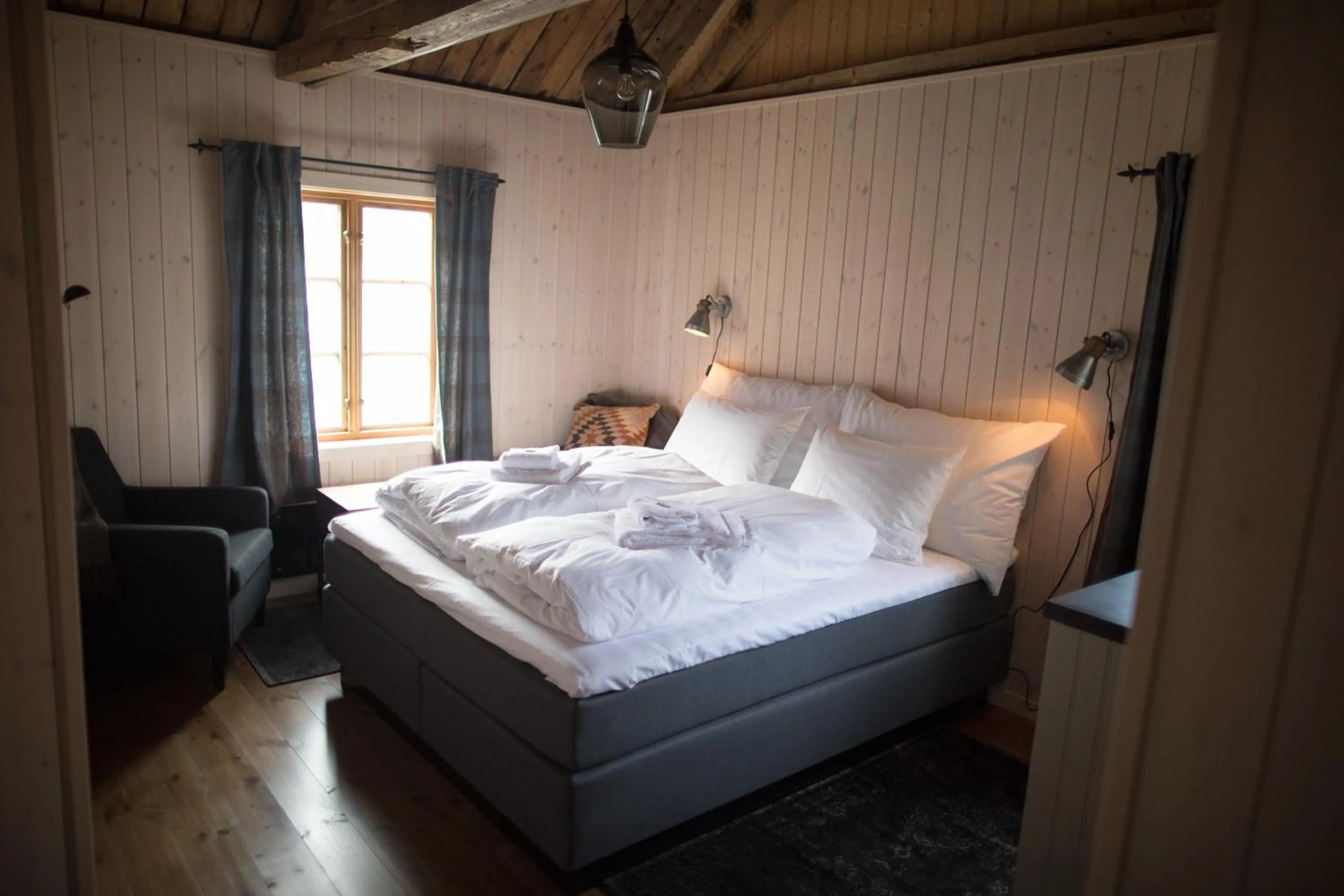 Bed in Reine Rorbuer - by Classic Norway Hotels
