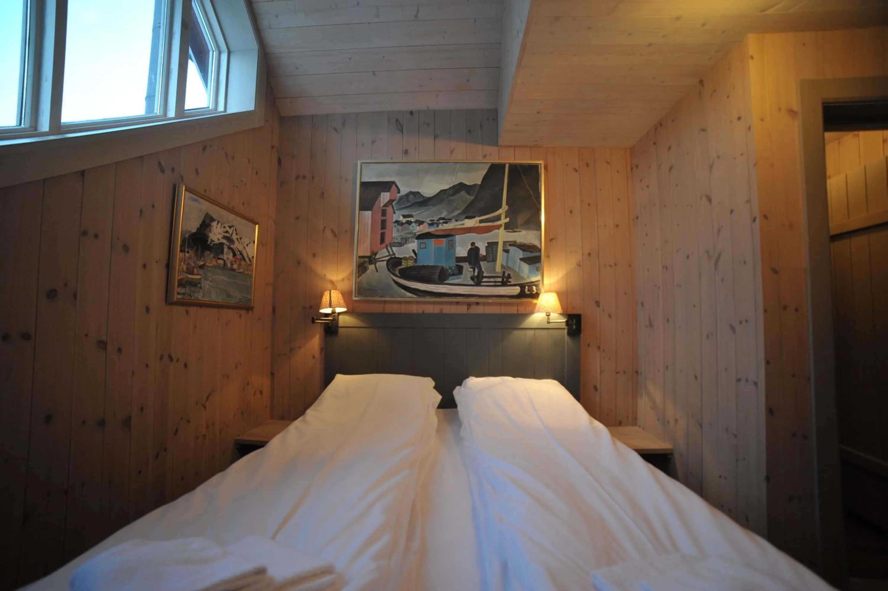 Bedroom, Bed in Reine Rorbuer - by Classic Norway Hotels