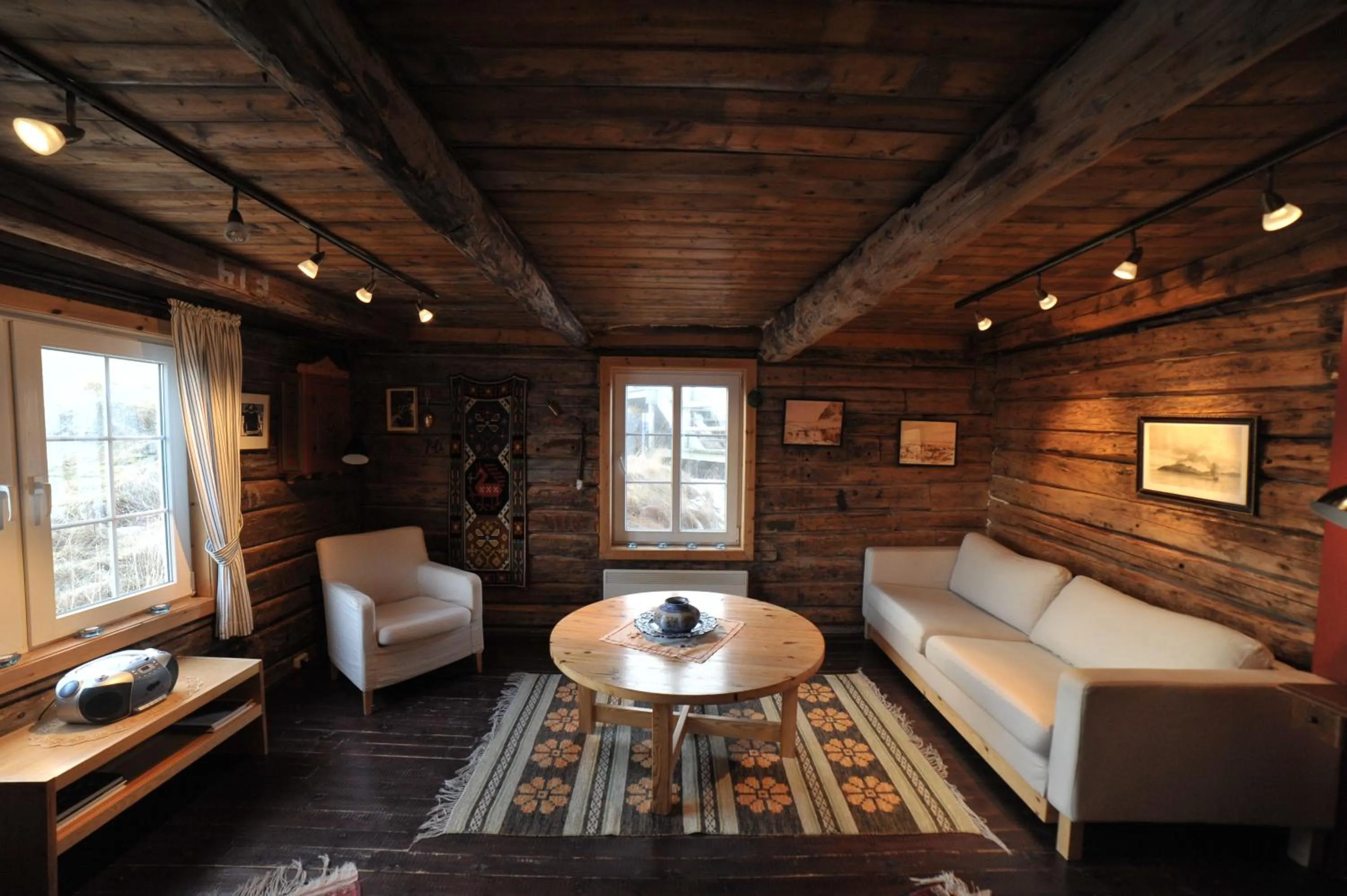 Living room in Reine Rorbuer - by Classic Norway Hotels