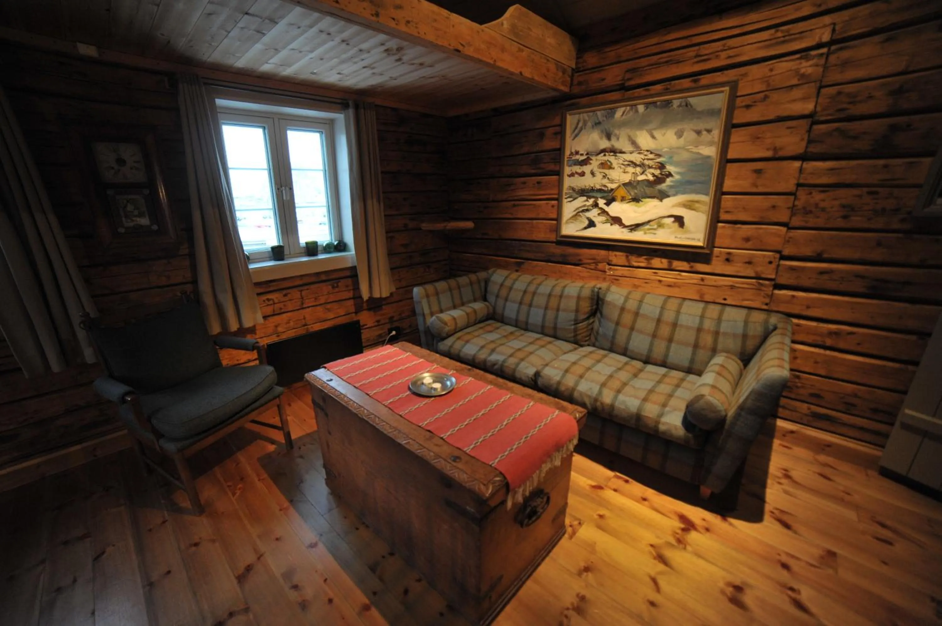 Living room in Reine Rorbuer - by Classic Norway Hotels