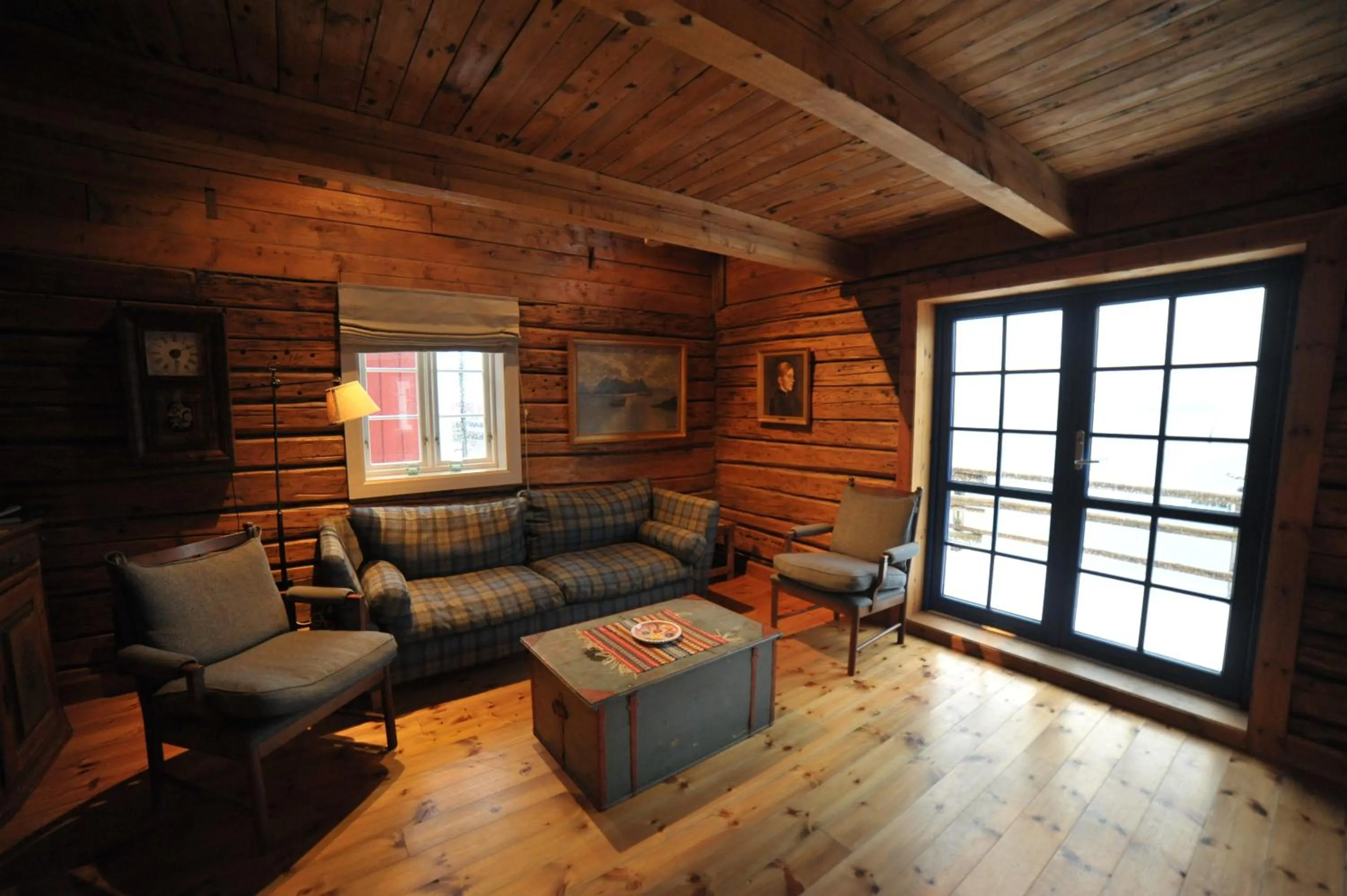 Living room in Reine Rorbuer - by Classic Norway Hotels