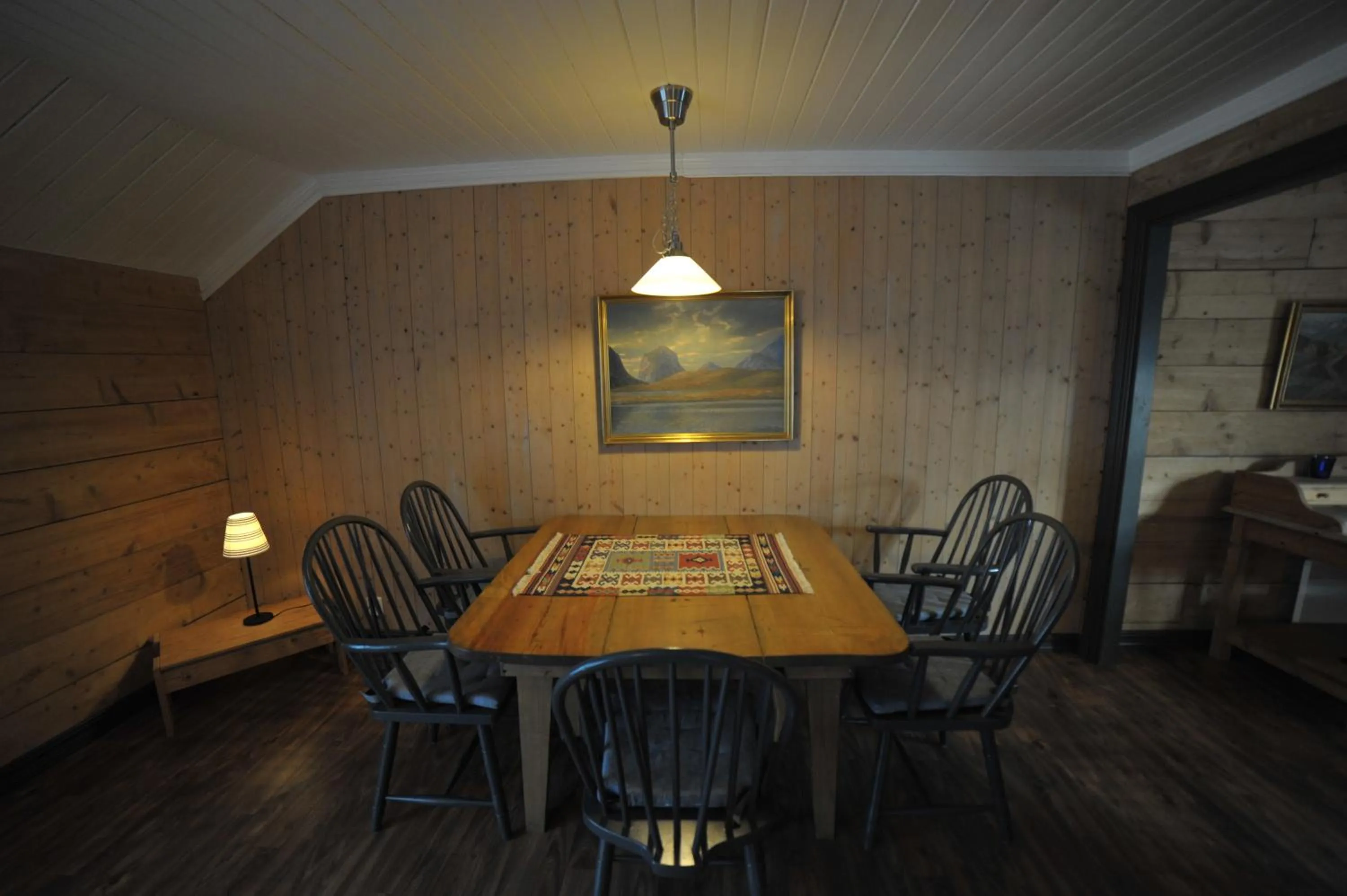 Dining area in Reine Rorbuer - by Classic Norway Hotels
