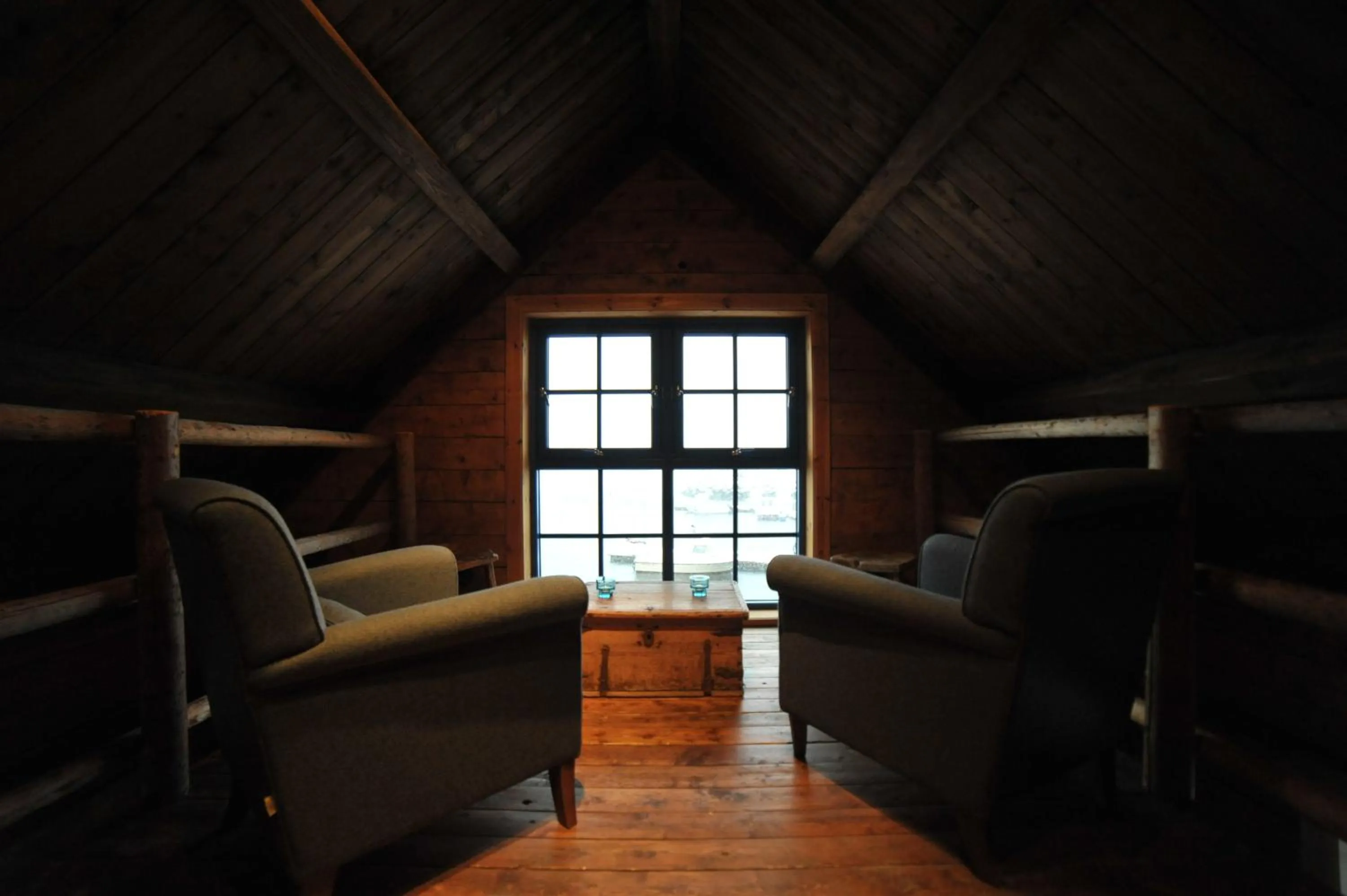 Living room in Reine Rorbuer - by Classic Norway Hotels