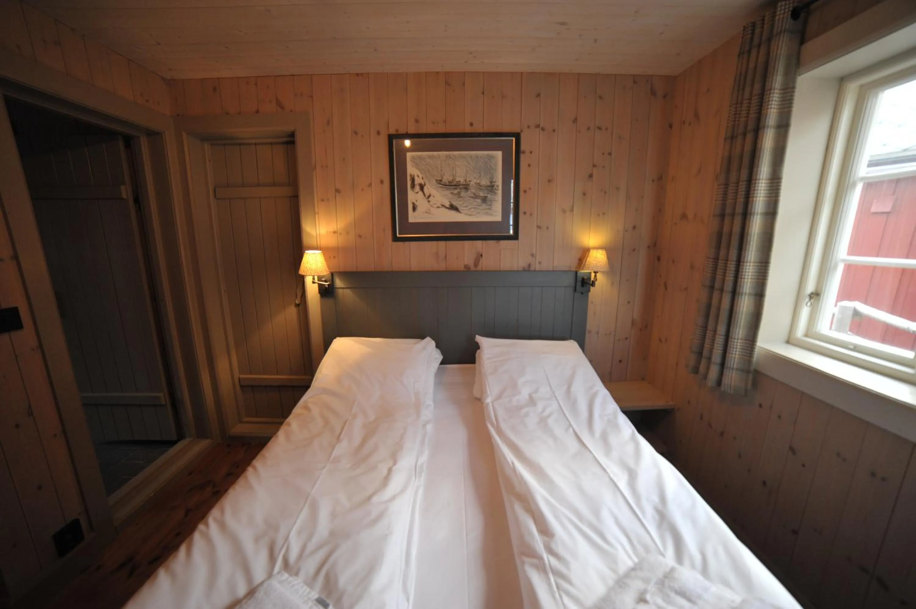 Bedroom, Bed in Reine Rorbuer - by Classic Norway Hotels