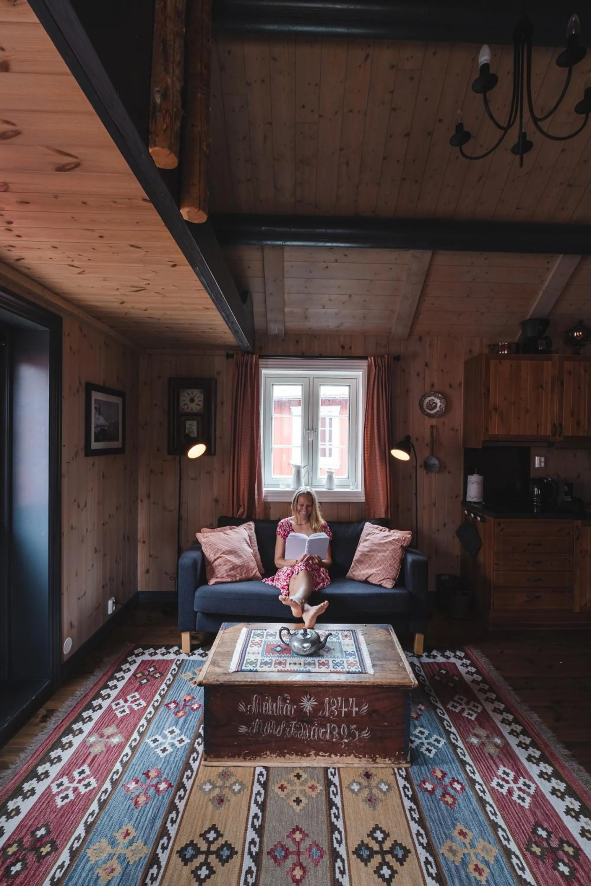 Living room in Reine Rorbuer - by Classic Norway Hotels