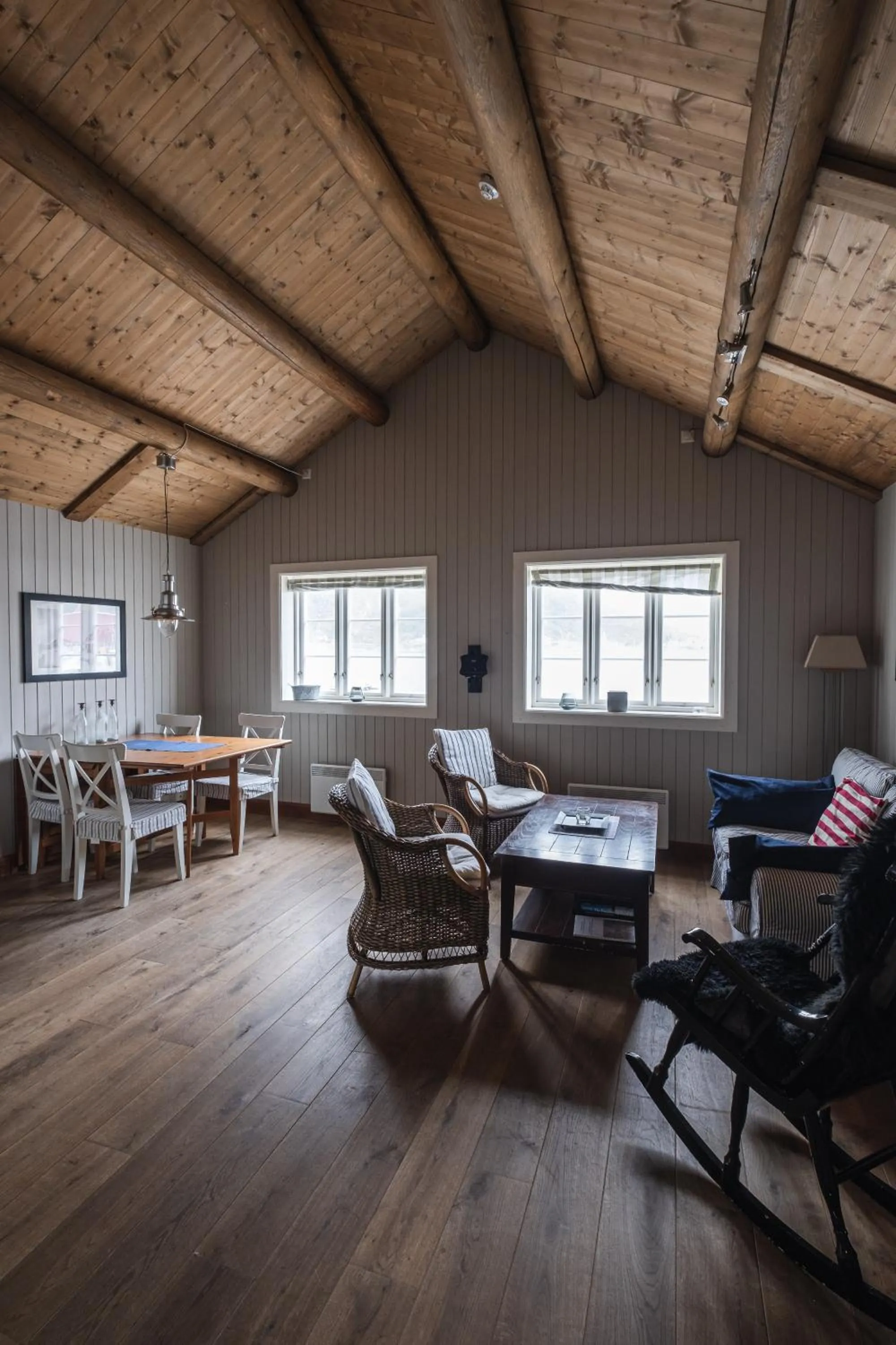 Seating area in Reine Rorbuer - by Classic Norway Hotels