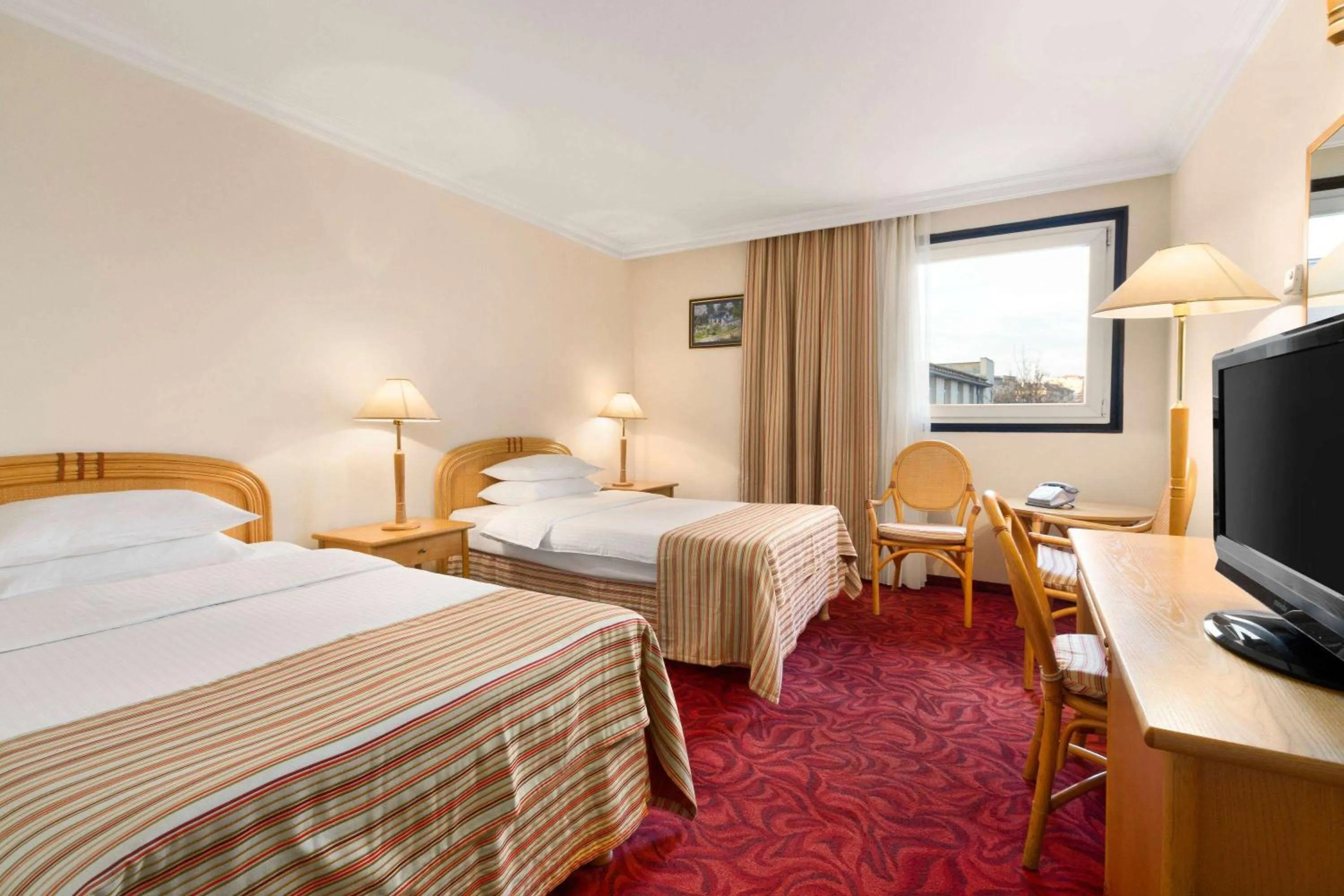 Photo of the whole room, Bed in Ramada by Wyndham Sofia City Center