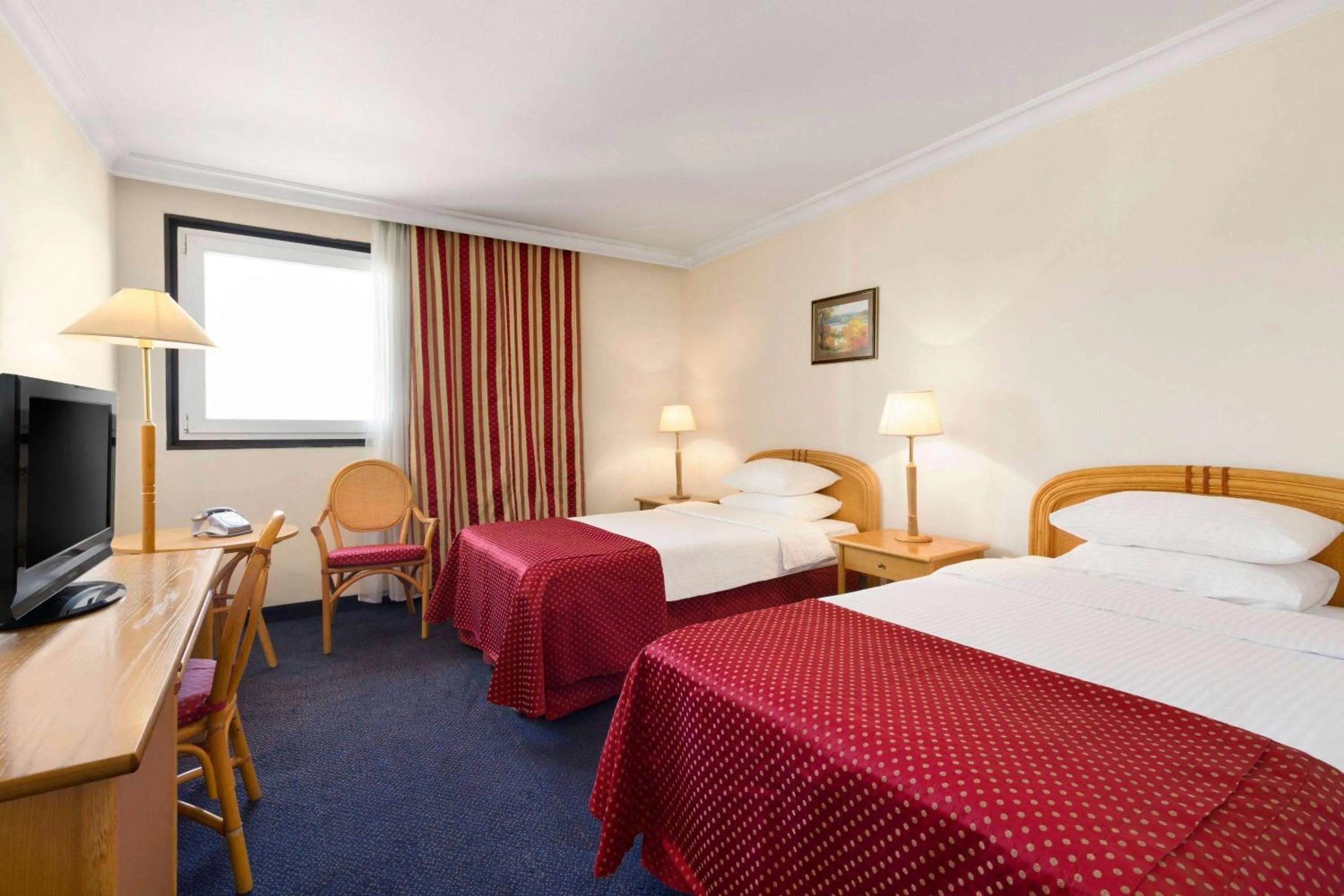 Photo of the whole room, Bed in Ramada by Wyndham Sofia City Center