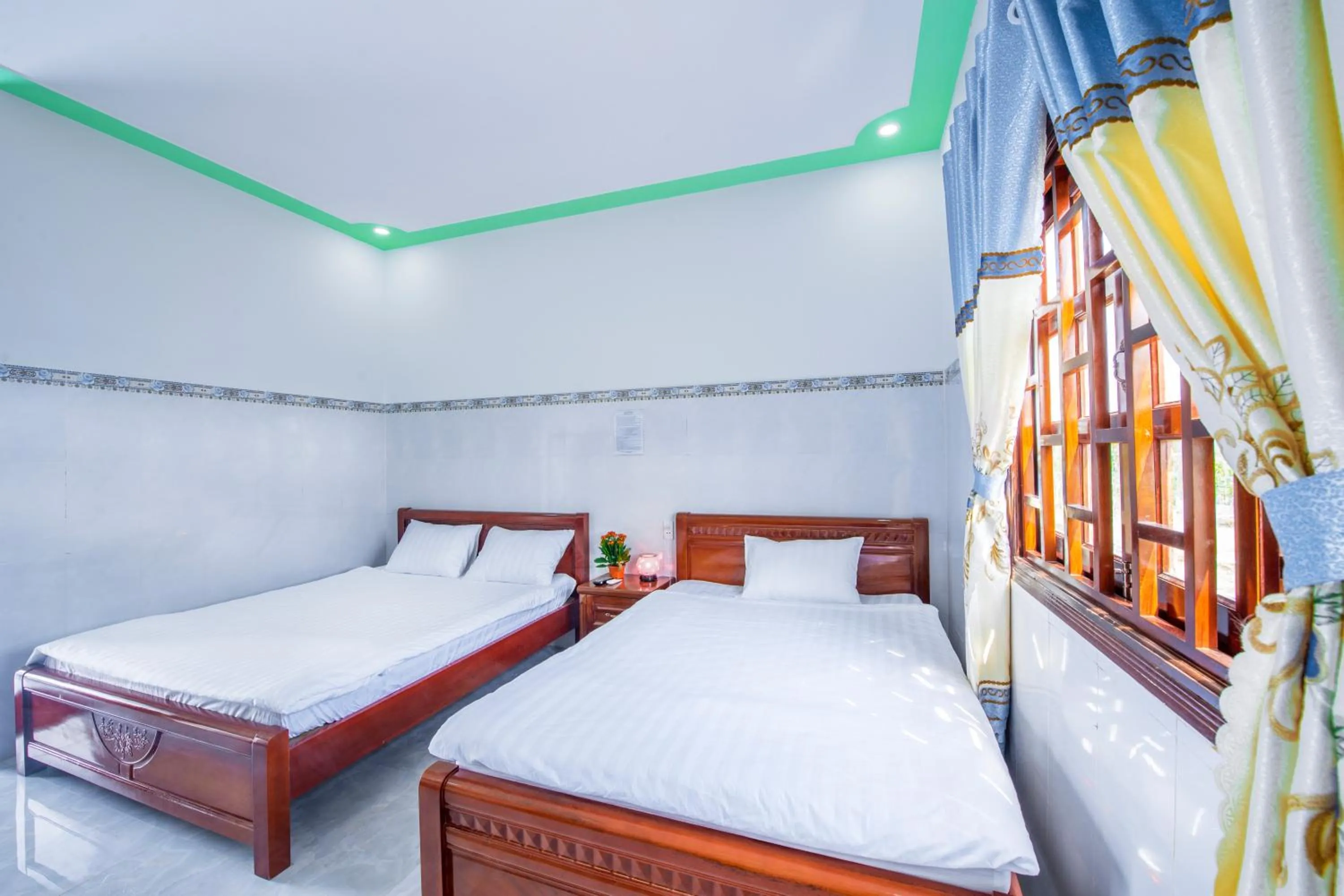 Bed in Hotel Nguyên Toàn