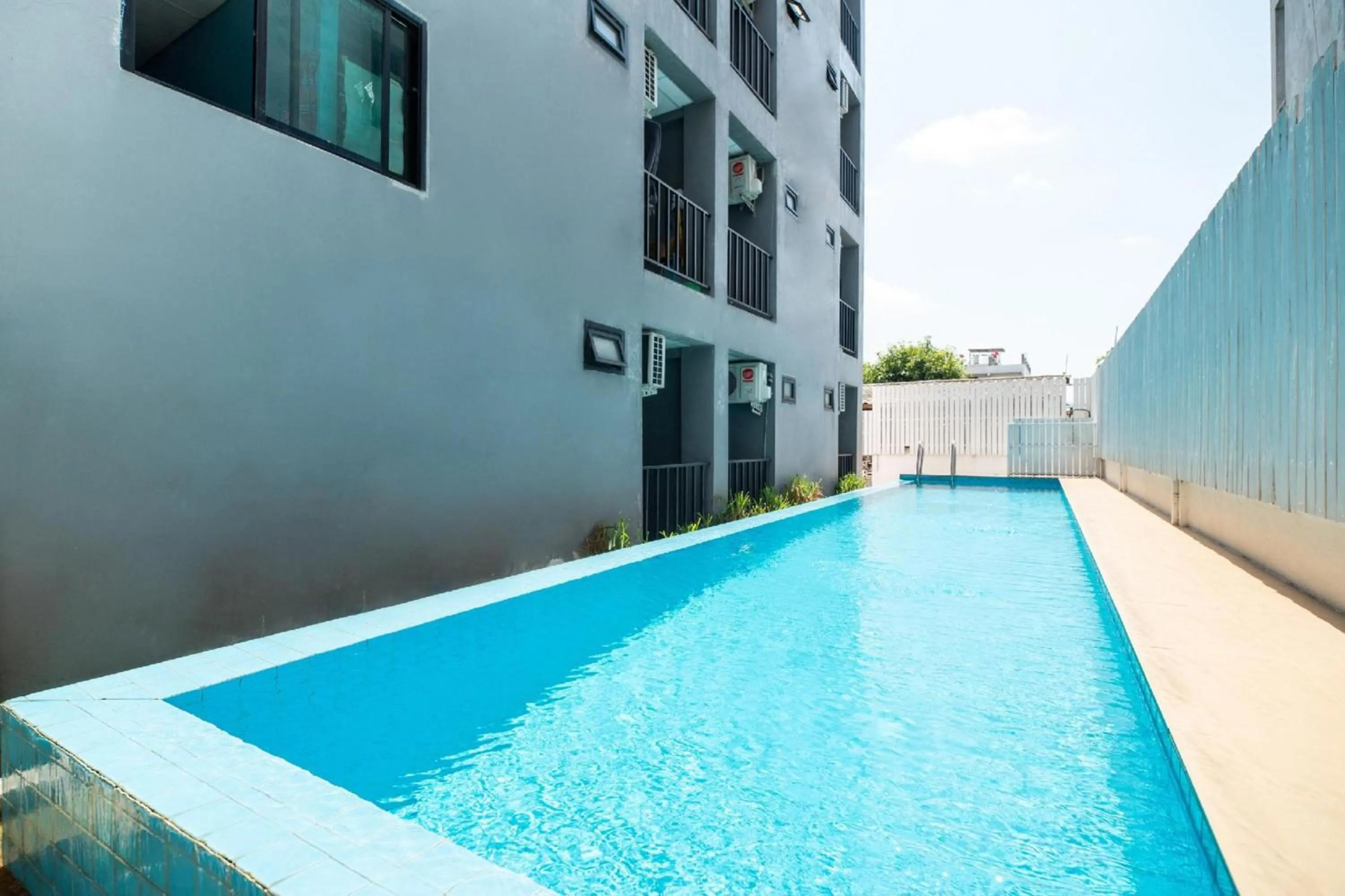 Swimming pool in Super OYO 427 Chill Apartment
