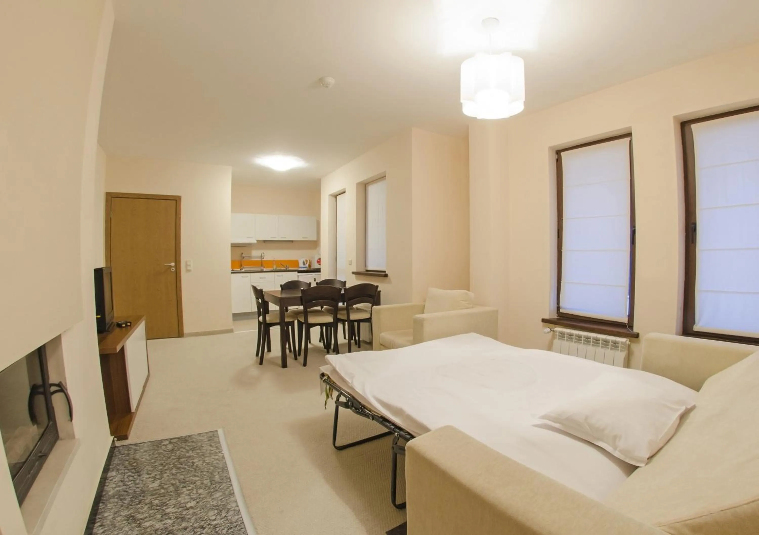 Living room, Bed in Green Life Family Apartments Pamporovo