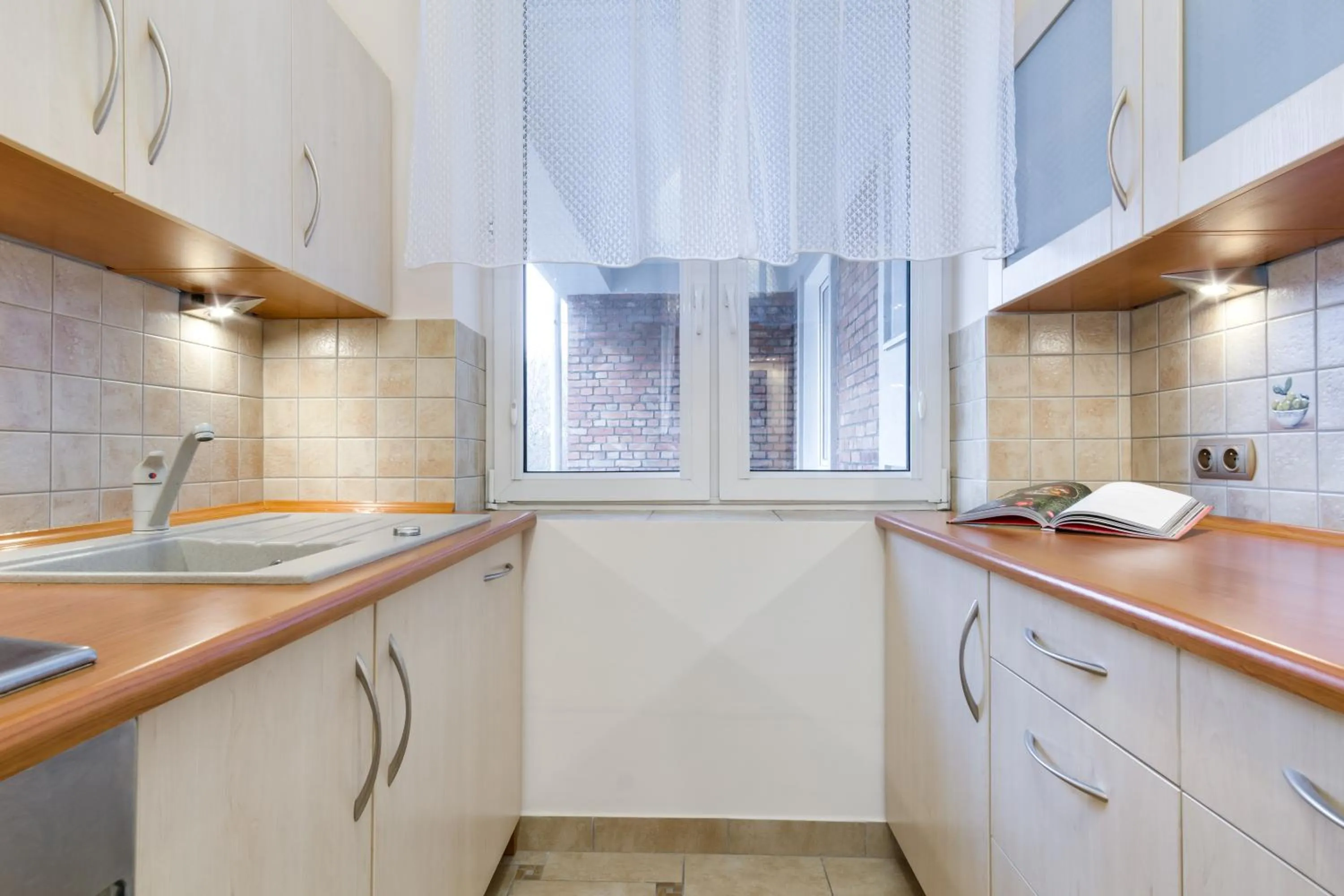 Kitchen or kitchenette in Elite Apartments Korzenna City Center