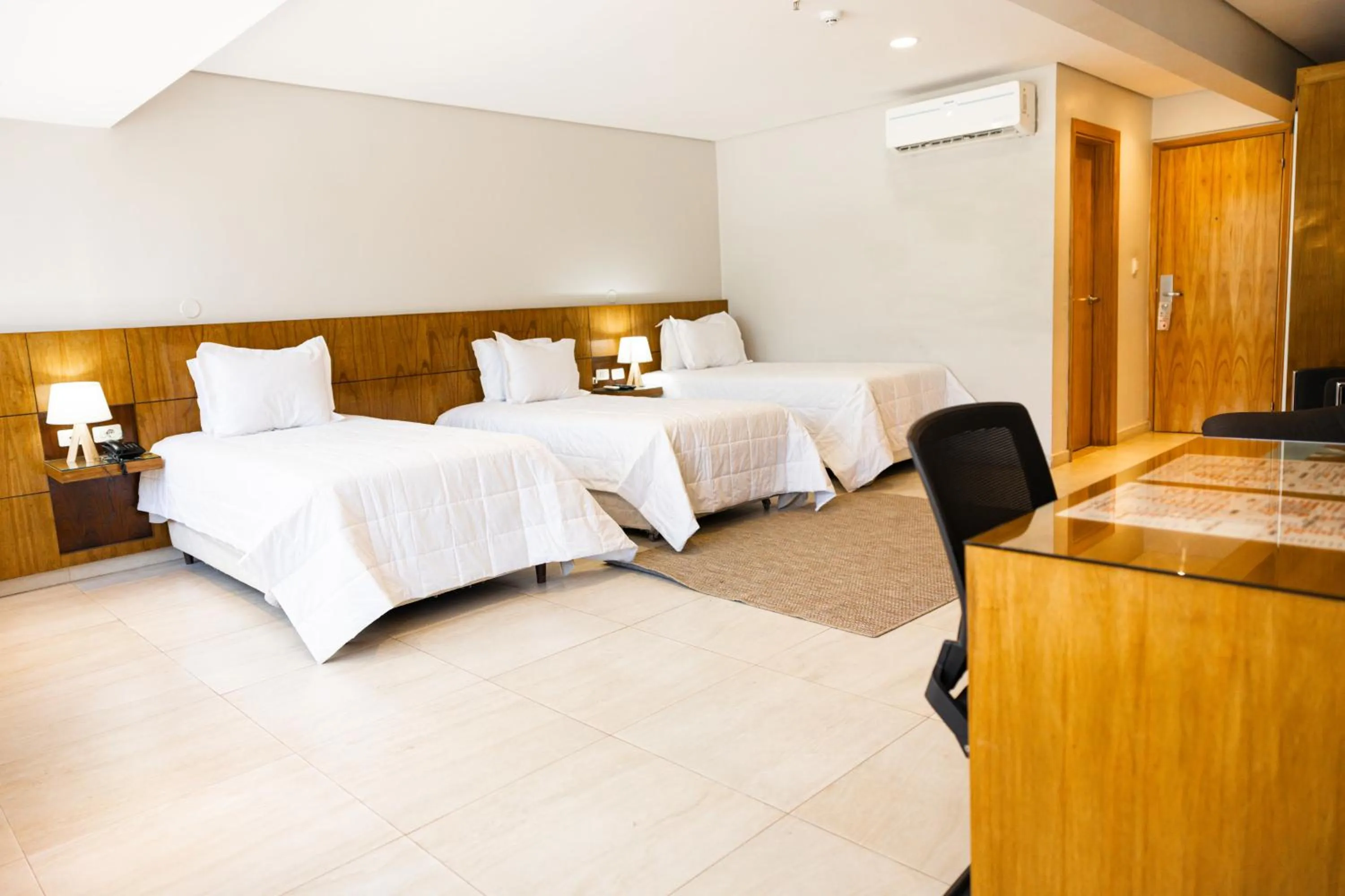 Bed in Hotel Le Pelican