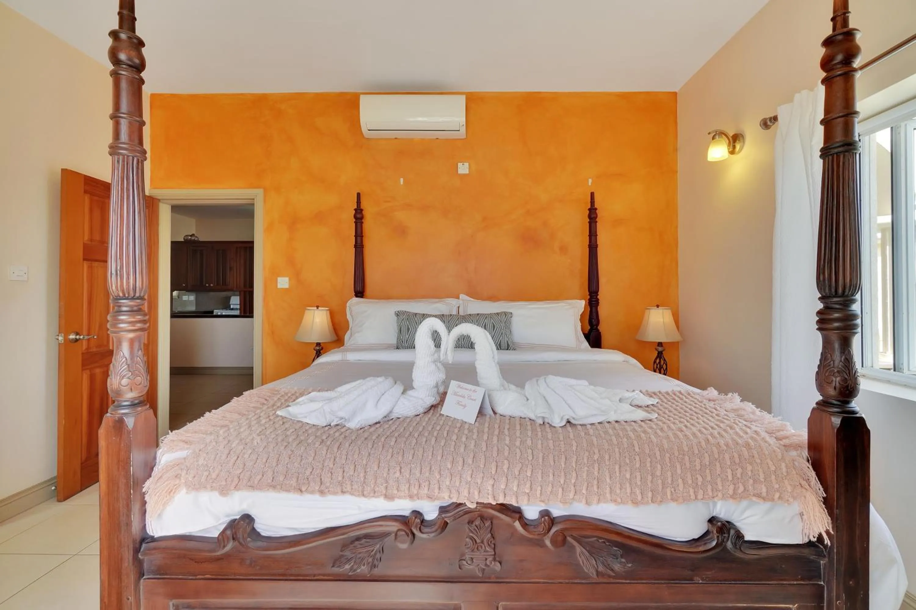 Bed in Mandela Court Suites Grenada