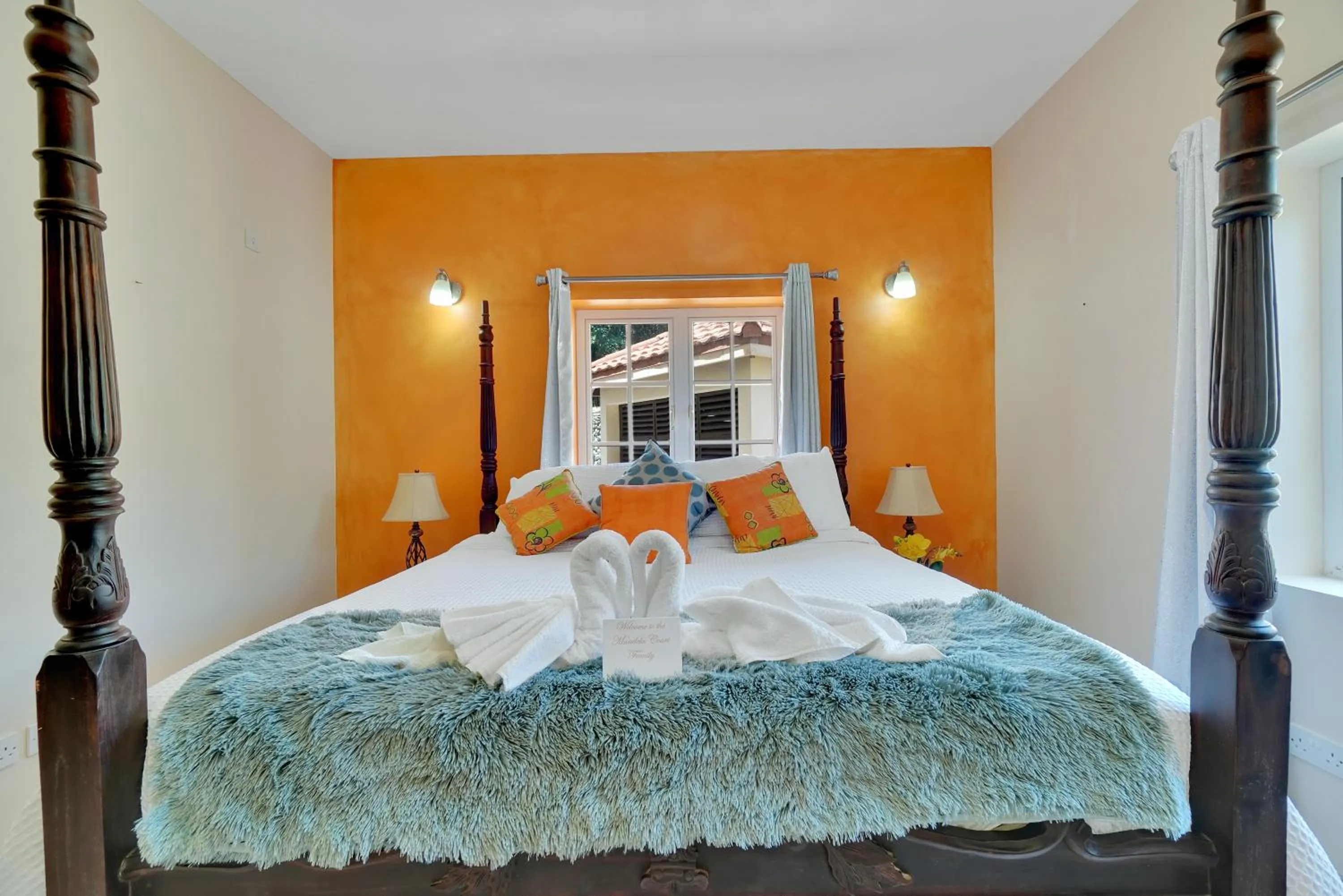 Bed in Mandela Court Suites Grenada