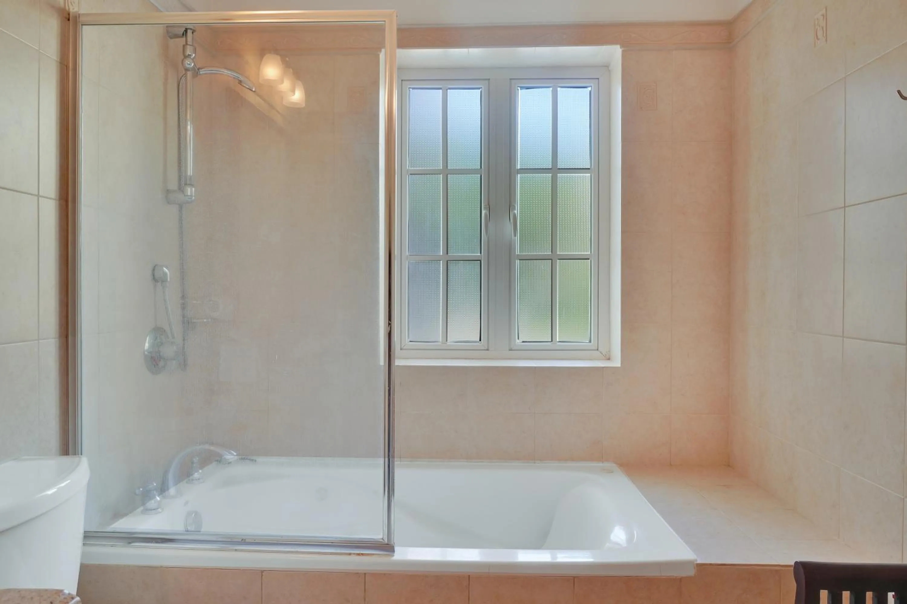 Shower in Mandela Court Suites Grenada