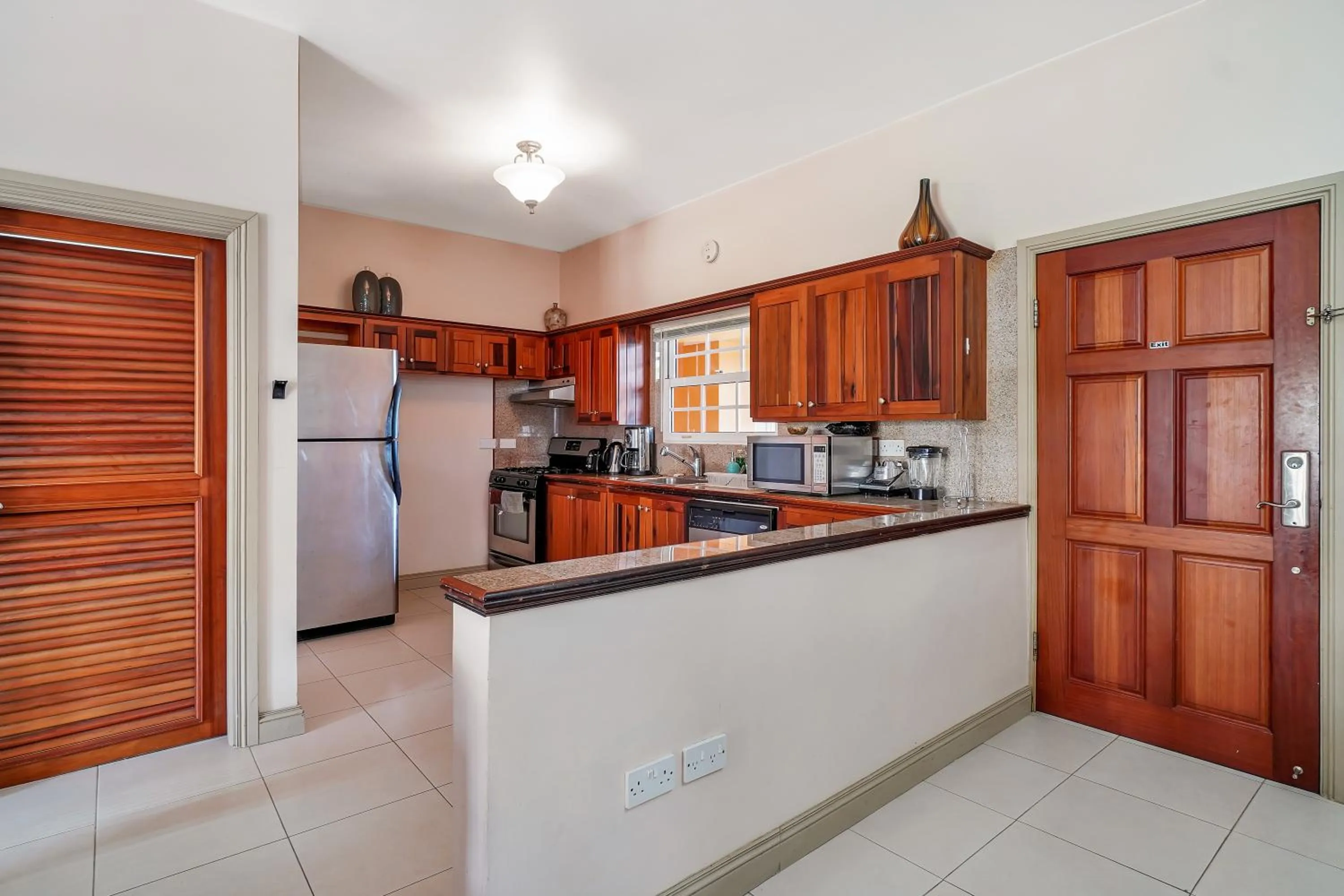 Kitchen or kitchenette in Mandela Court Suites Grenada