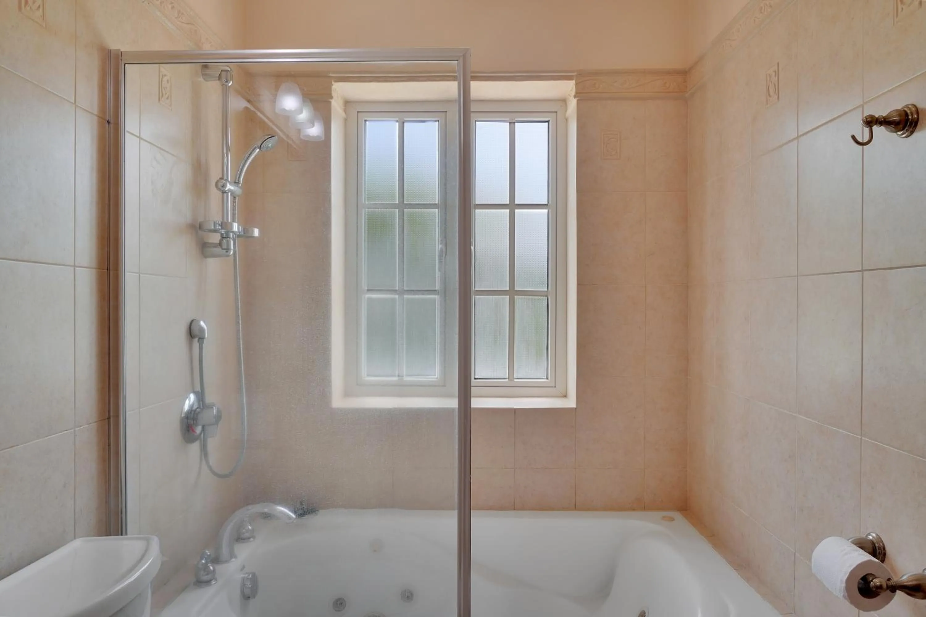 Shower in Mandela Court Suites Grenada