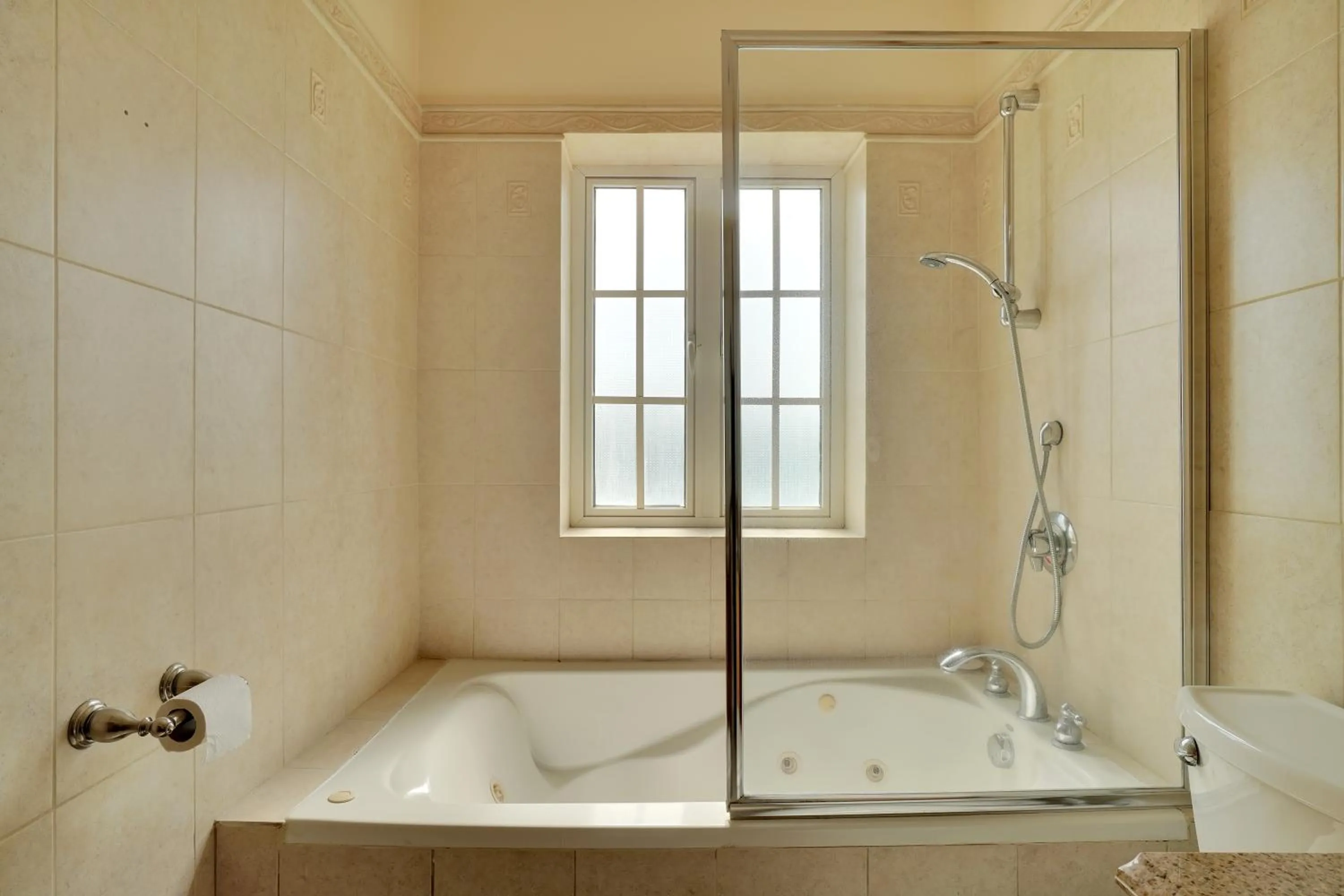 Shower in Mandela Court Suites Grenada