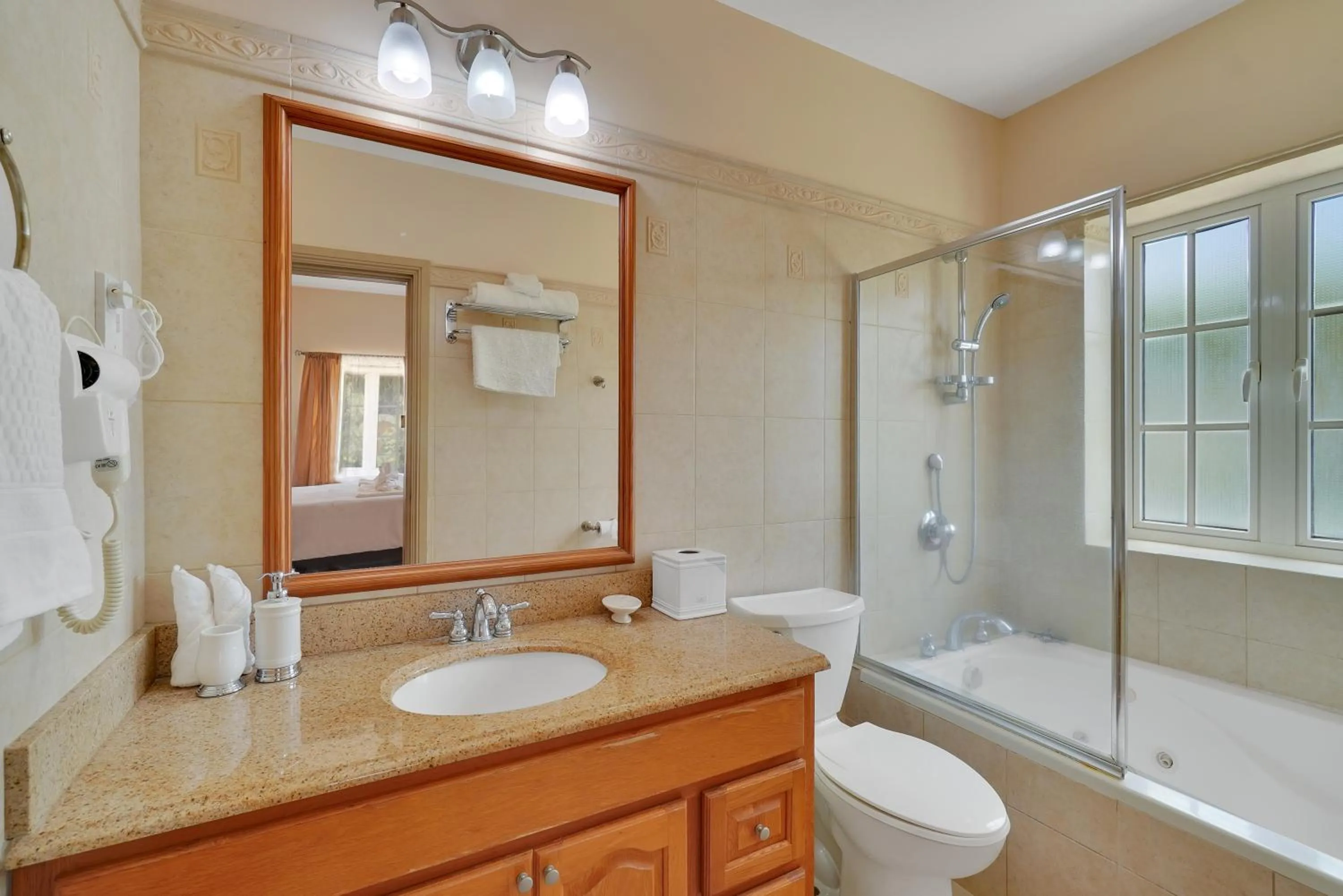 Shower in Mandela Court Suites Grenada