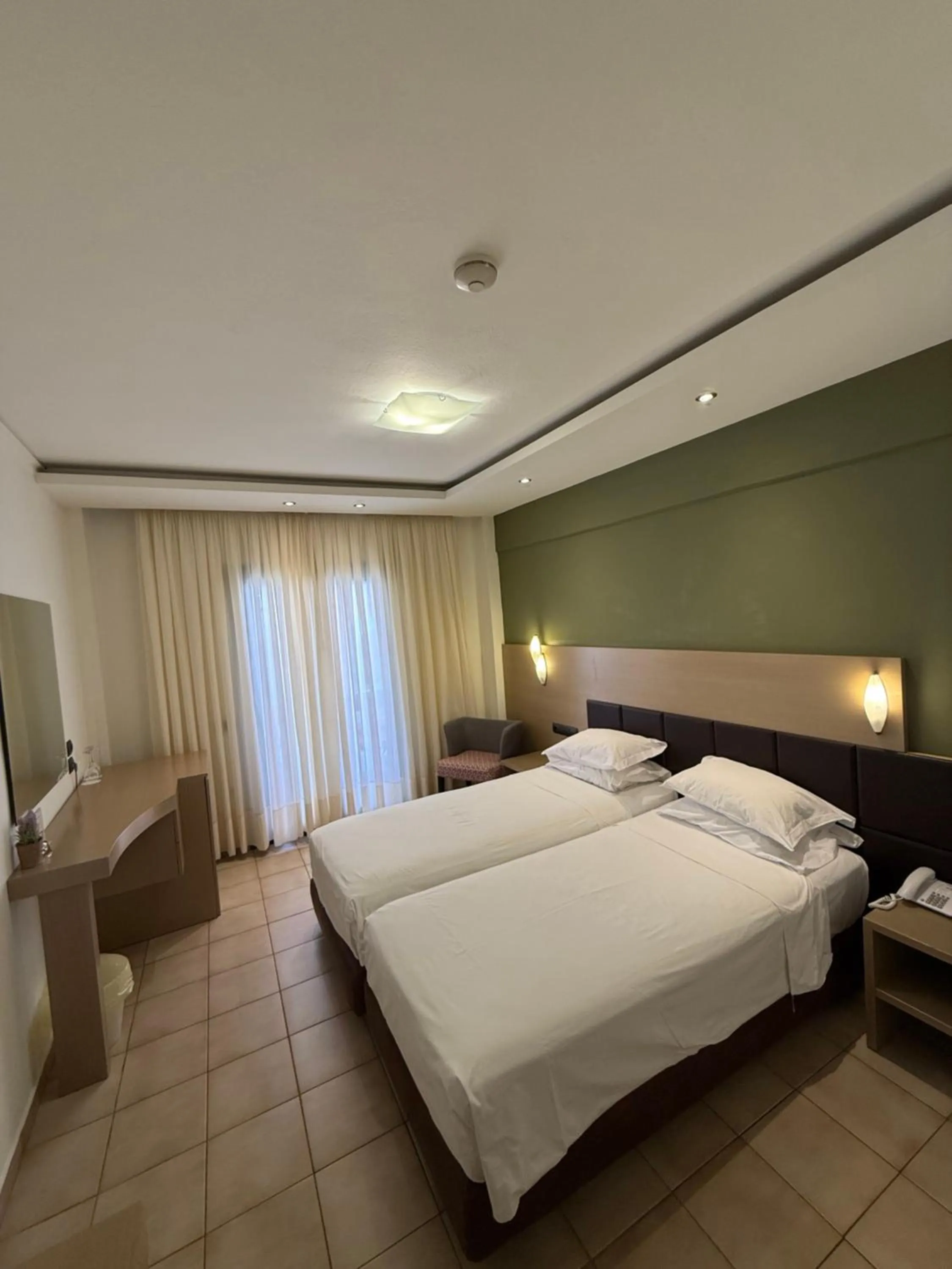 Bed in Aeolis Hotel