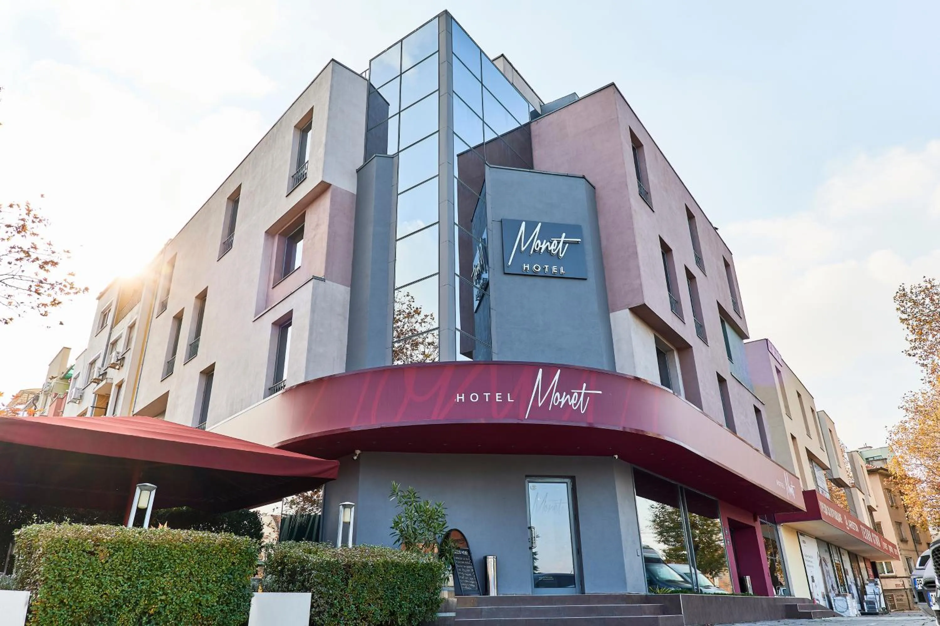 Property logo or sign in Monet Hotel