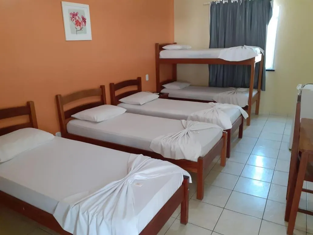 Bed in Pousada Raio de Sol