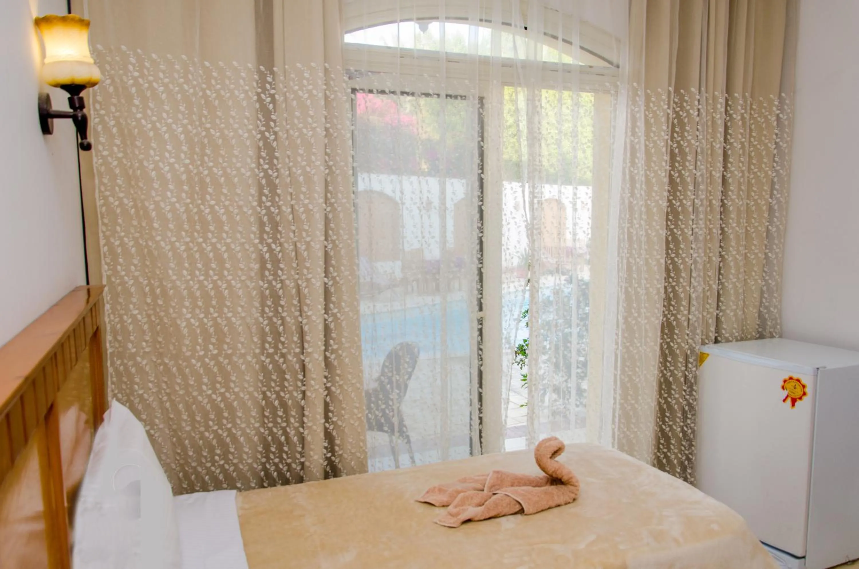 Bed in New Yalla Hotel