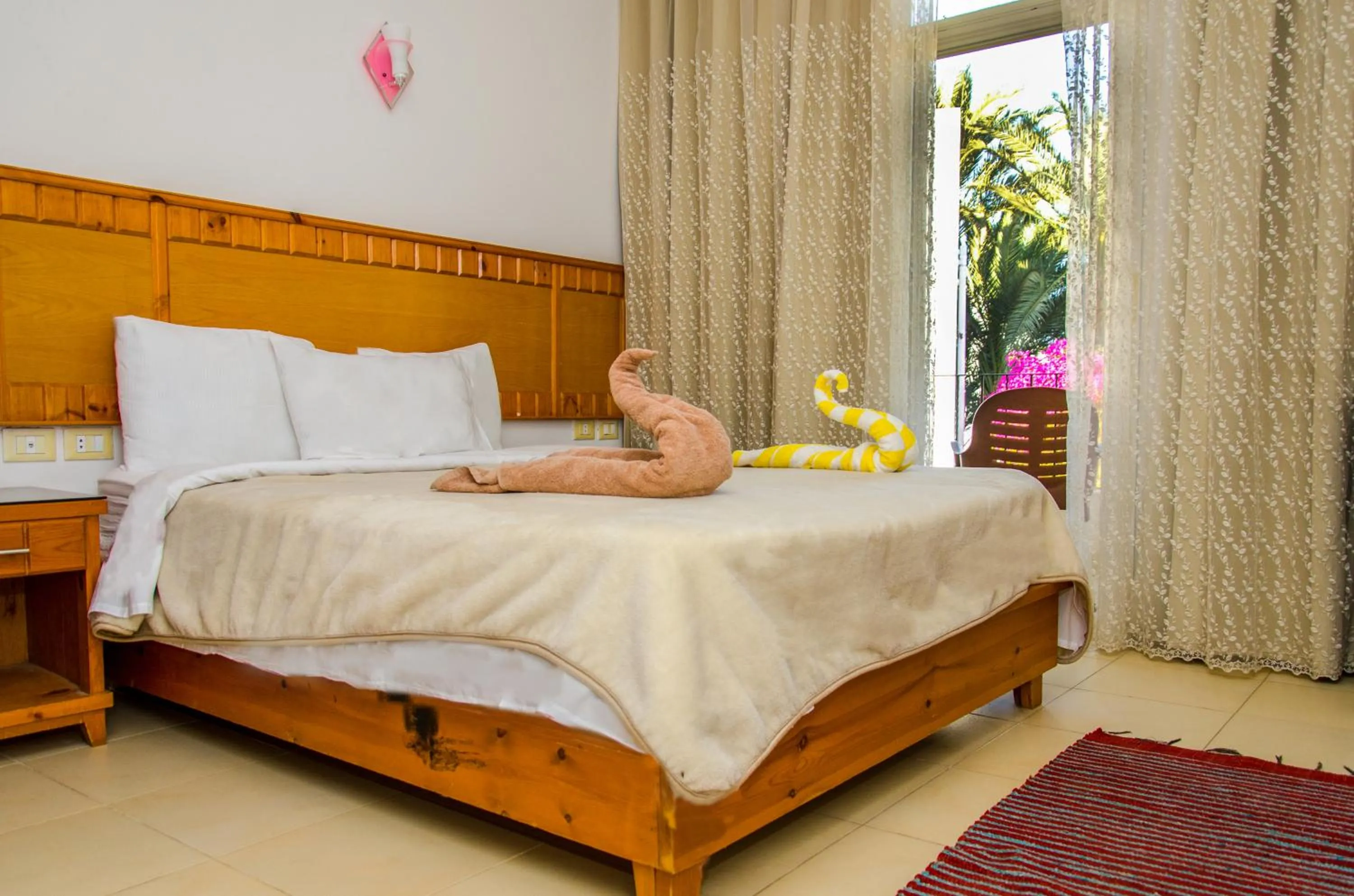 Bed in New Yalla Hotel