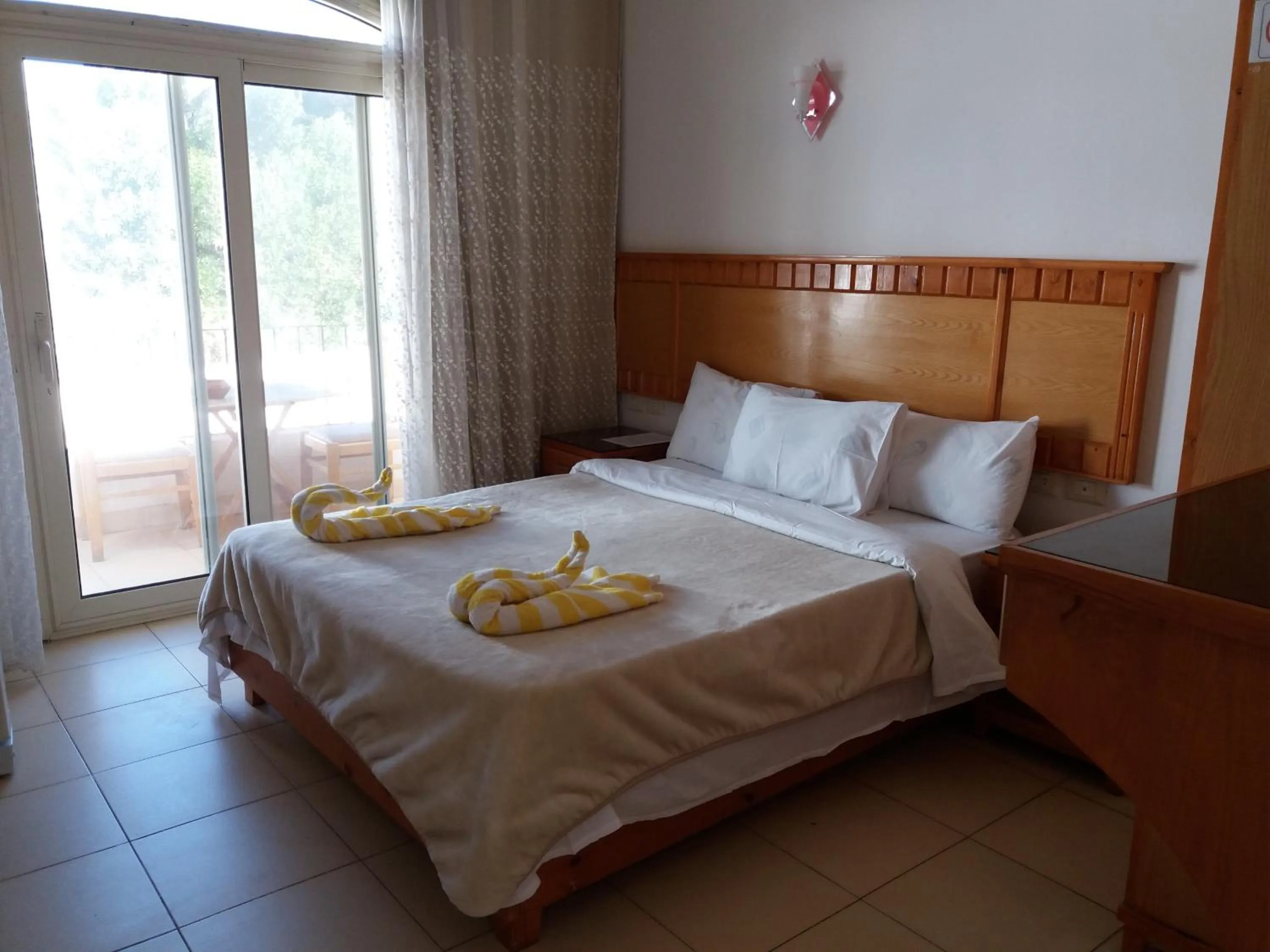 Photo of the whole room, Bed in New Yalla Hotel