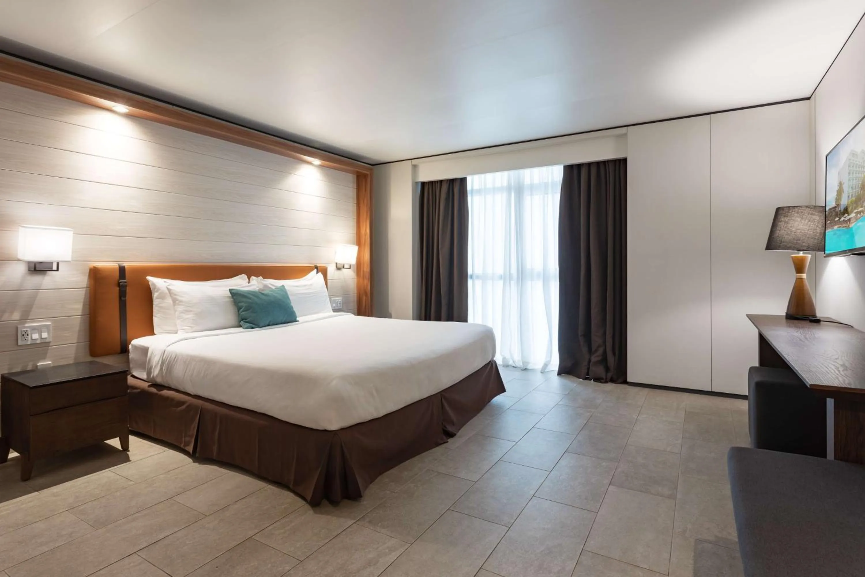 Photo of the whole room, Bed in Sonesta Maho Beach All Inclusive Resort Casino & Spa